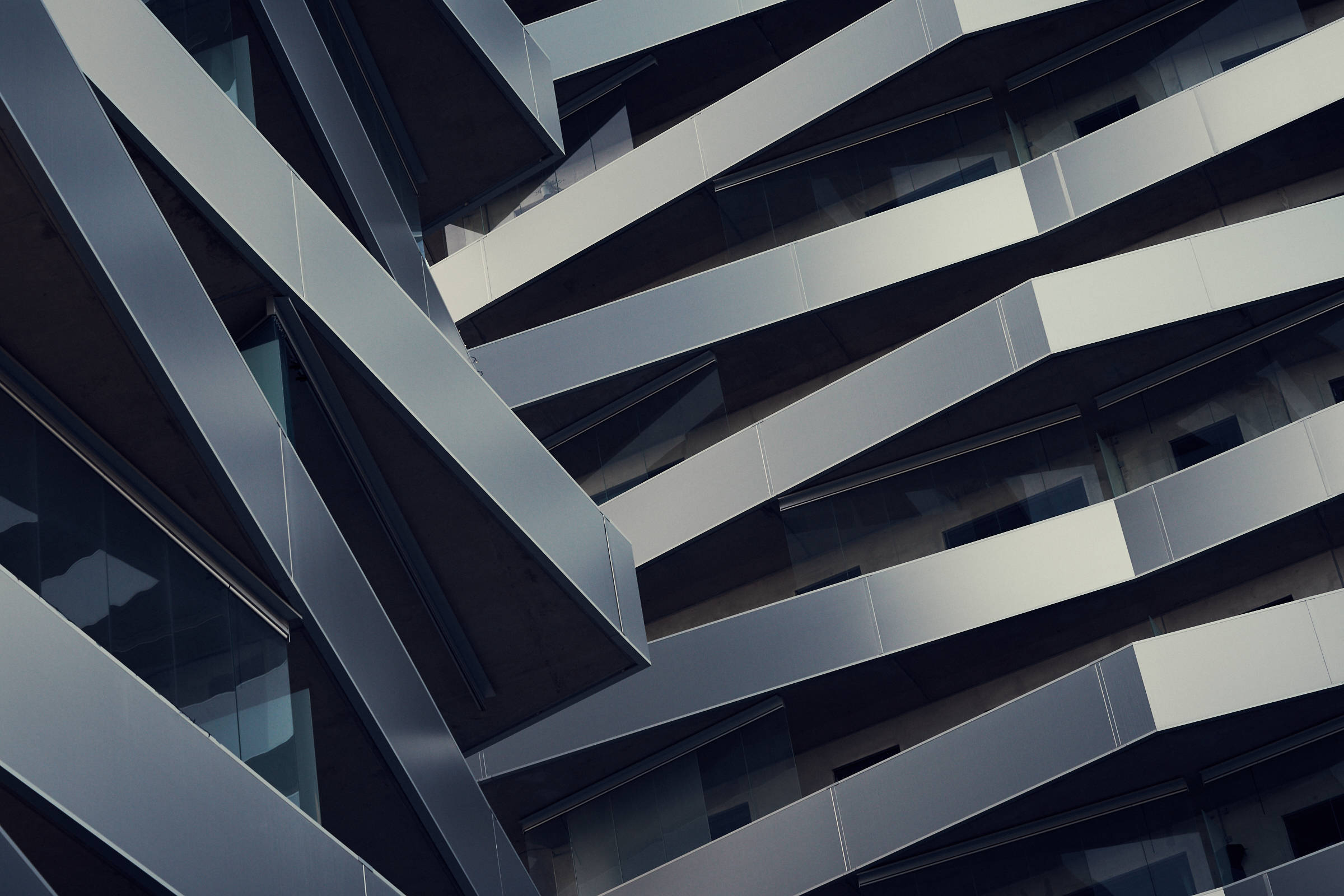 geometric metal building architecture, angular gray balconies, glass windows, Full HD Desktop Wallpaper
