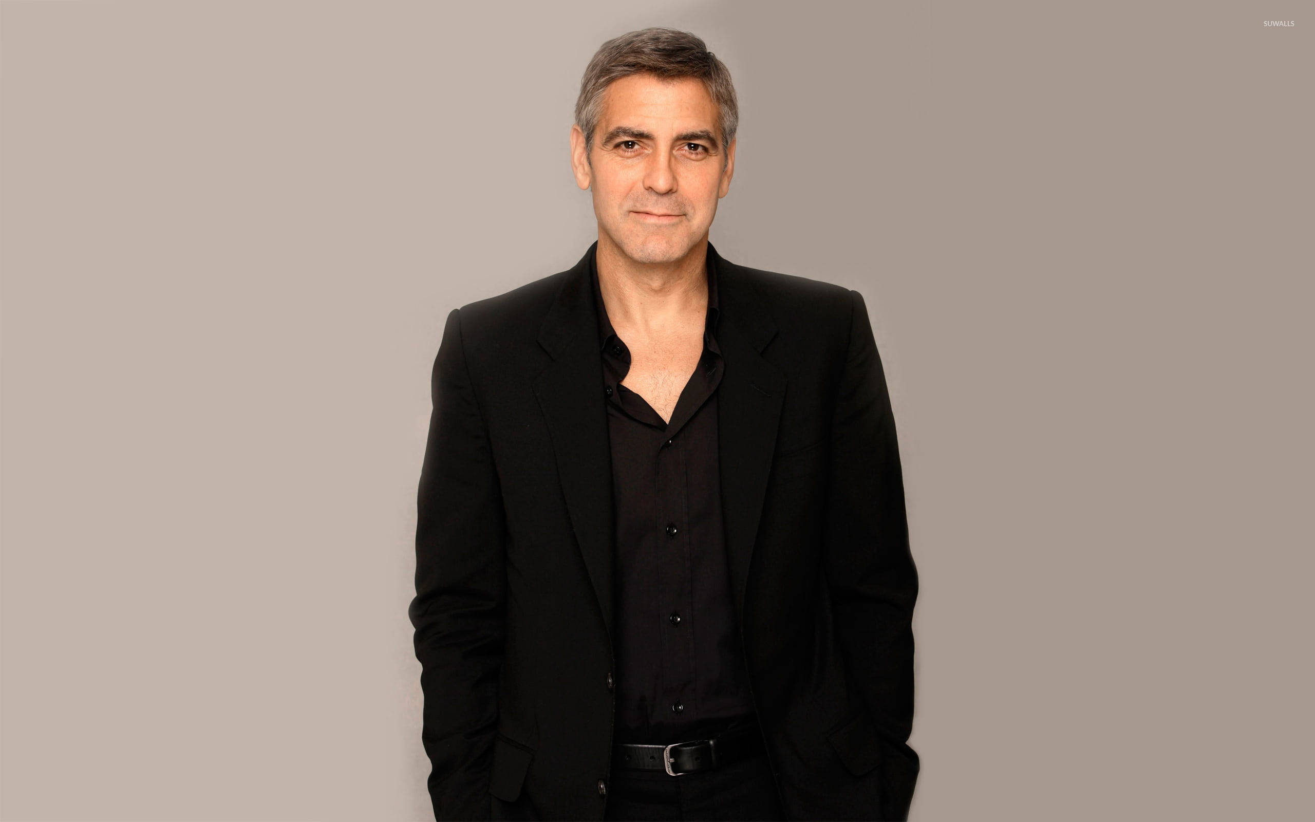 George Clooney, black suit, plain gray background, 2K Desktop Wallpaper