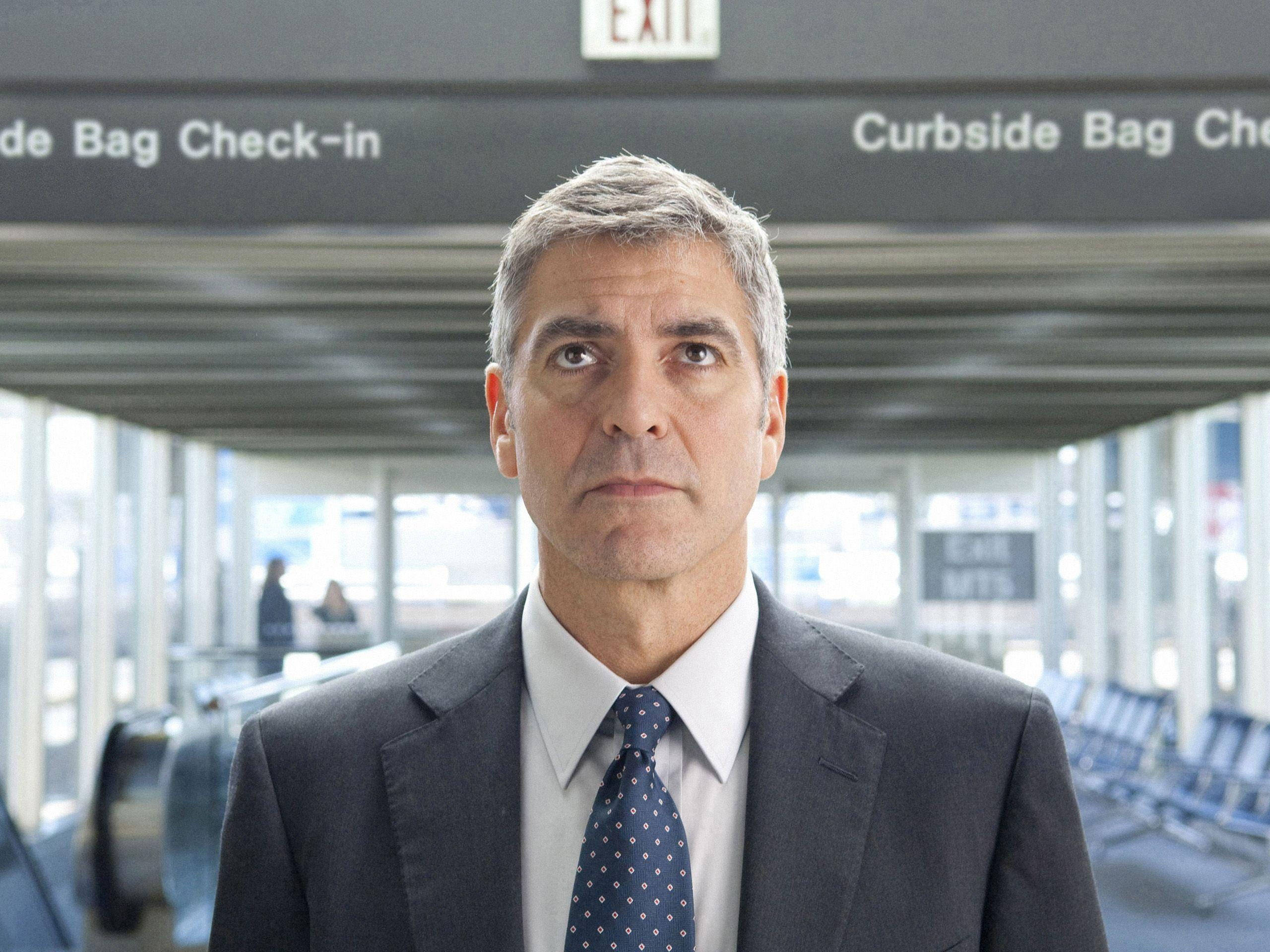 George Clooney, airport terminal, Curbside Bag Check-in, 2K Desktop Wallpaper