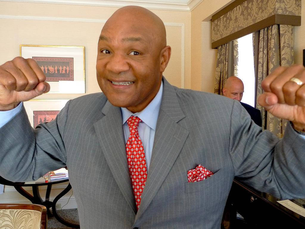 George Foreman, gray pinstripe suit, red patterned tie, SD Desktop Wallpaper