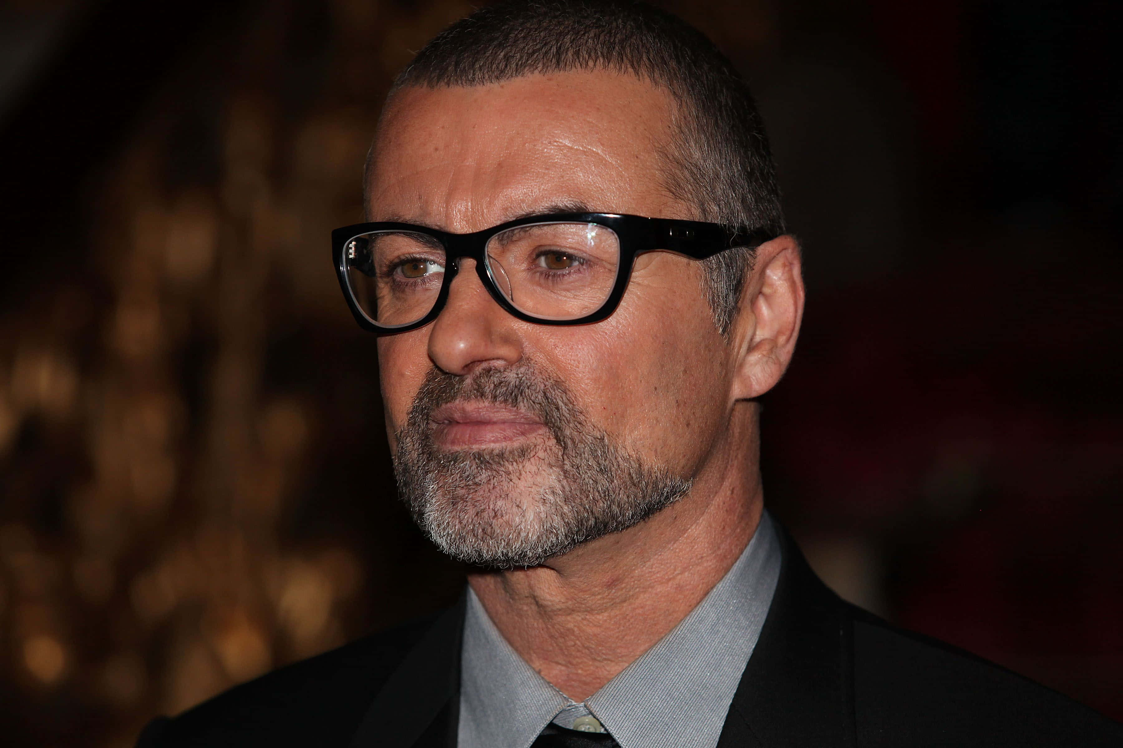 George Michael, glasses, gray beard, 2K Desktop Wallpaper