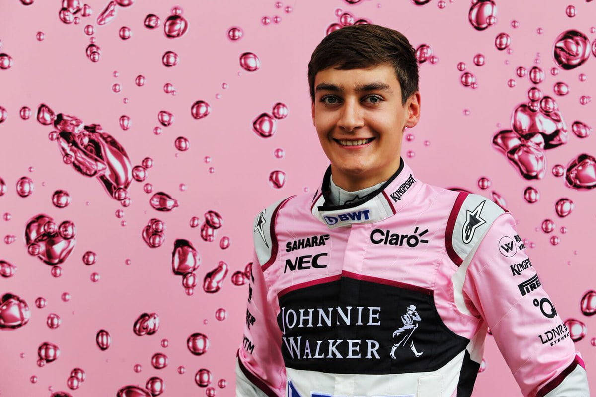 George Russell, pink and black racing suit, vibrant pink background, SD Desktop Wallpaper