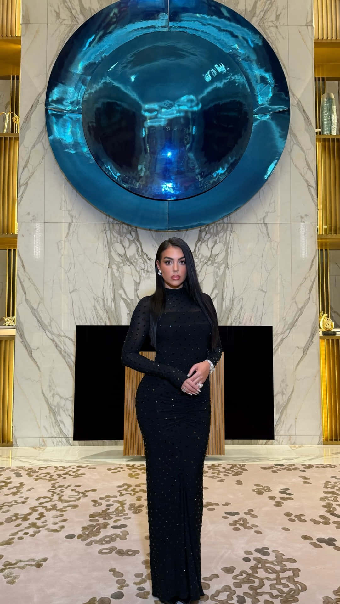 Georgina Rodríguez, sparkling black gown, massive blue circular sculpture, Full HD Phone Wallpaper