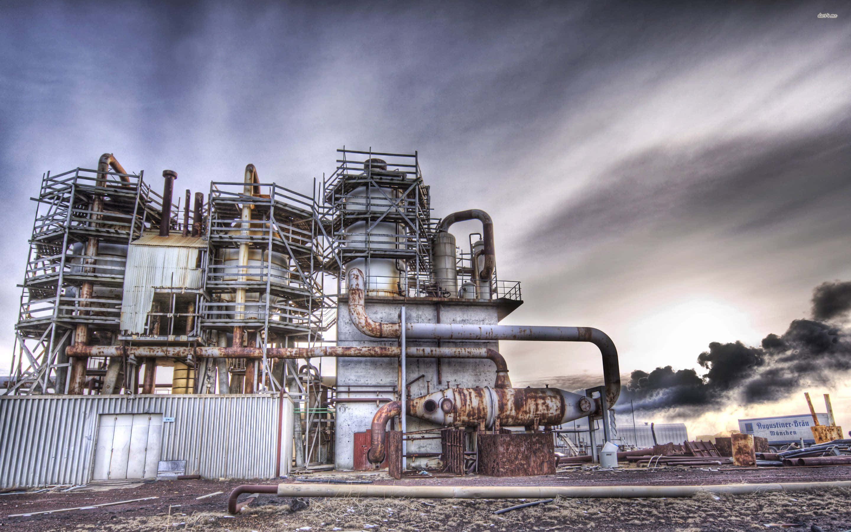 industrious energy factory, rusted industrial refinery complex, dramatic cloudy sky, 2K Desktop Wallpaper