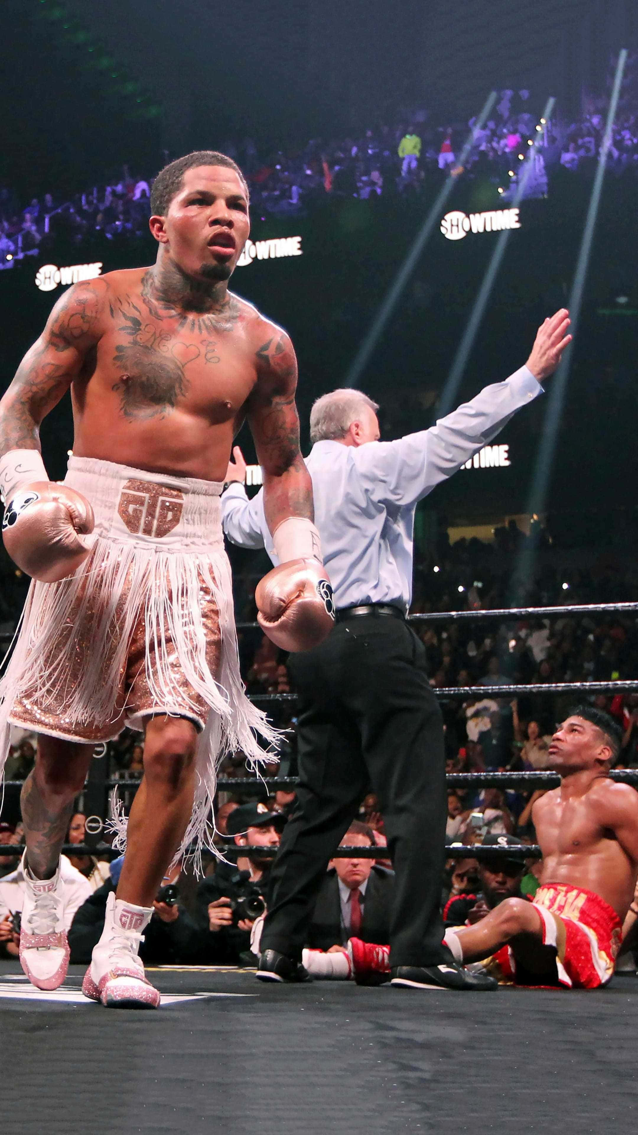 Gervonta Davis, fringed shorts, arena lights, 4K Phone Wallpaper