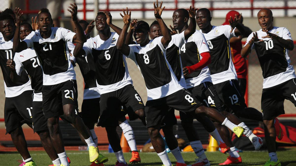 Ghana National Football Team, black and white jerseys, sunlit grass field, SD Desktop Wallpaper