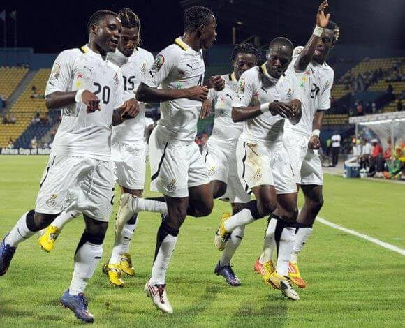Ghana National Football Team, white uniforms, vibrant green field, SD Desktop Wallpaper