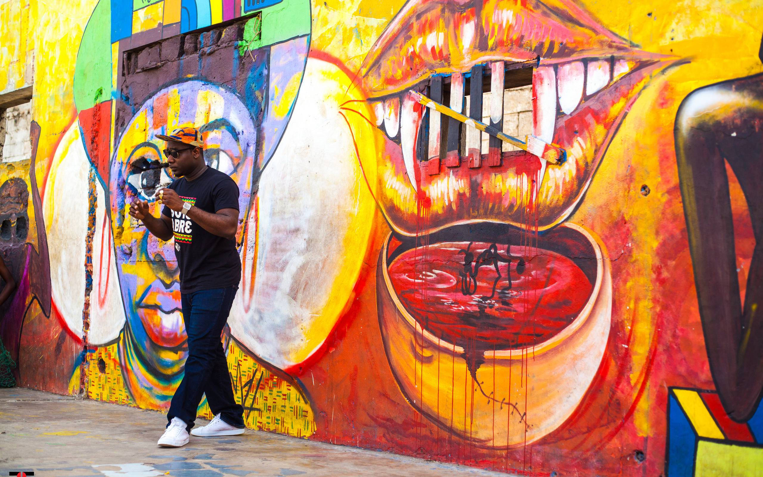 Ghana, vibrant graffiti mural, giant open mouth, 2K Desktop Wallpaper