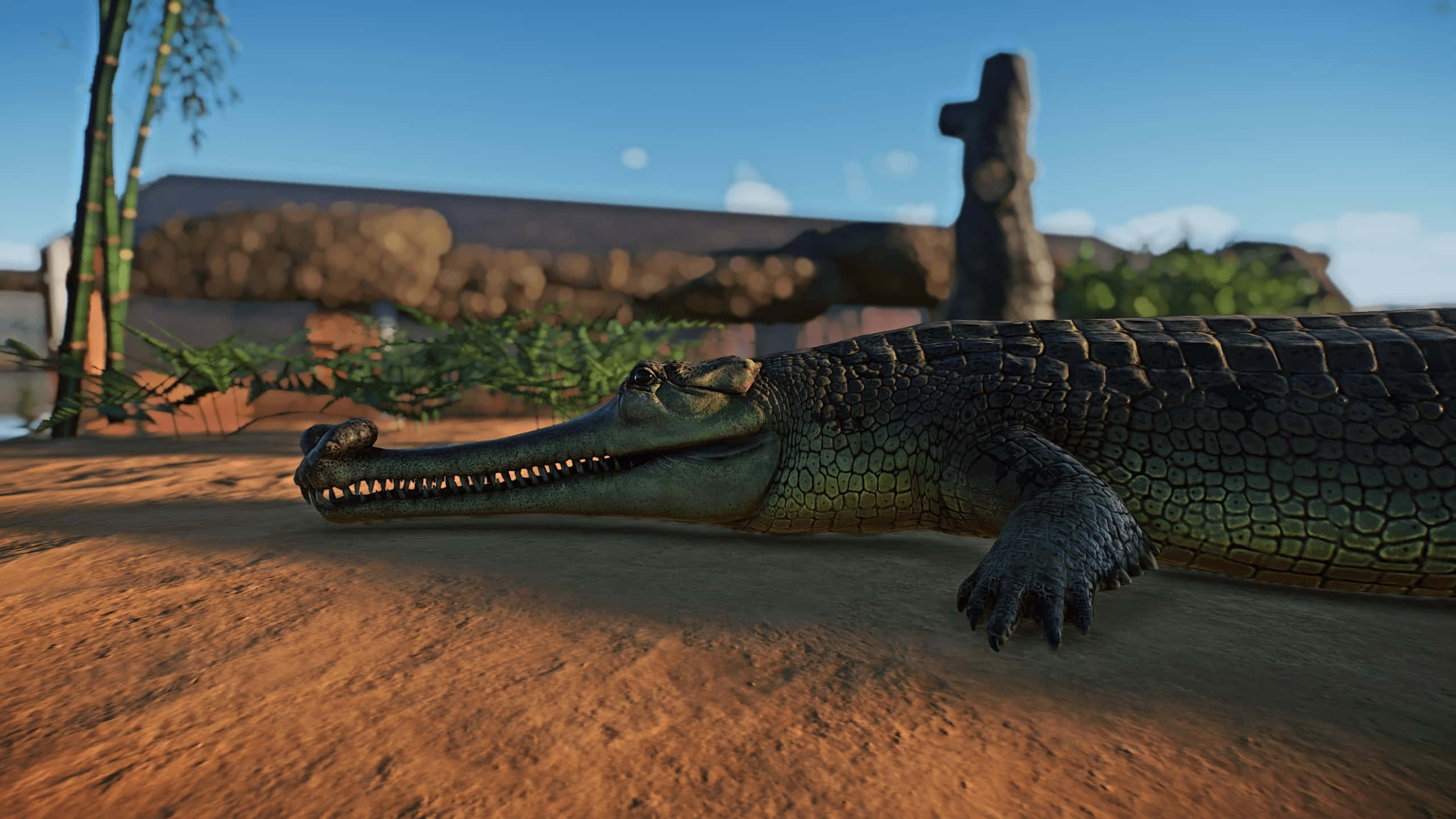 Gharial, sunlit orange earth, stone structure, 2K Desktop Wallpaper