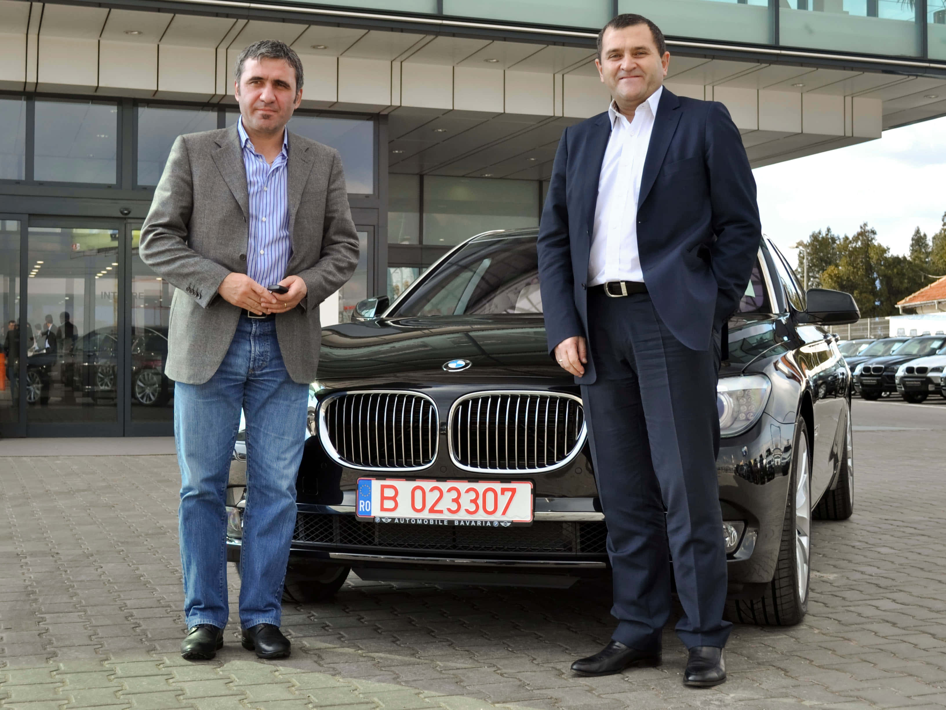 Gheorghe Hagi, BMW SUV, sleek black, 2K Desktop Wallpaper