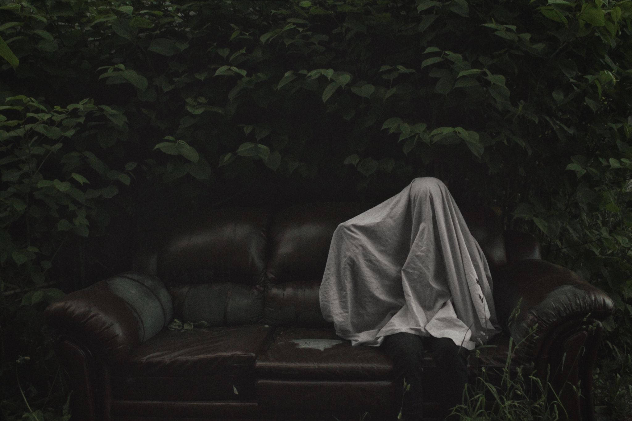 ghostly figure, white cloth, weathered leather couch, Full HD Desktop Wallpaper
