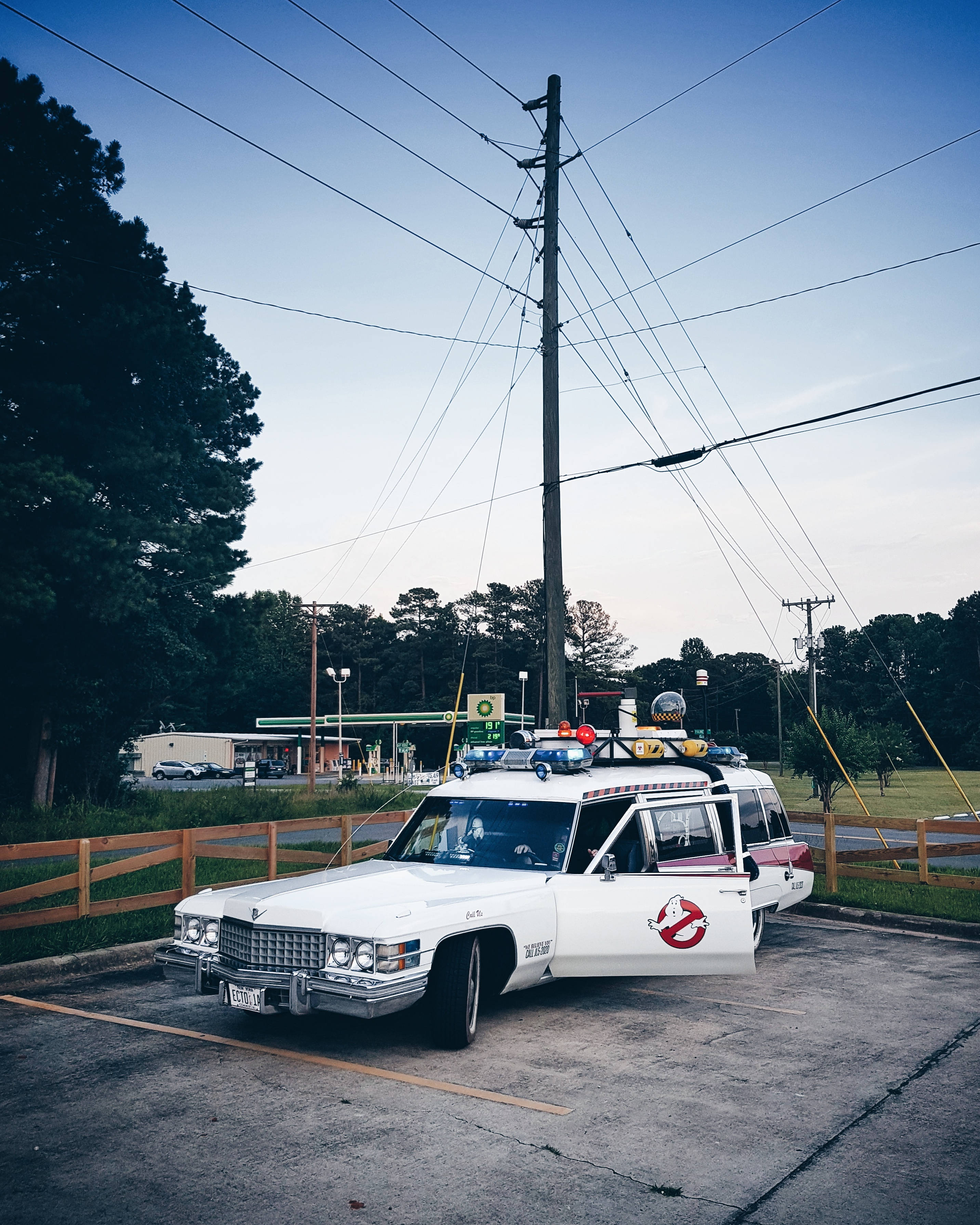 Ghostbusters, white 1980s Cadillac hearse, Ghostbusters logo, 2K Phone Wallpaper