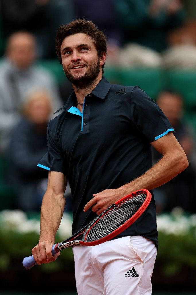 Gilles Simon, black and blue shirt, red racket, SD Phone Wallpaper