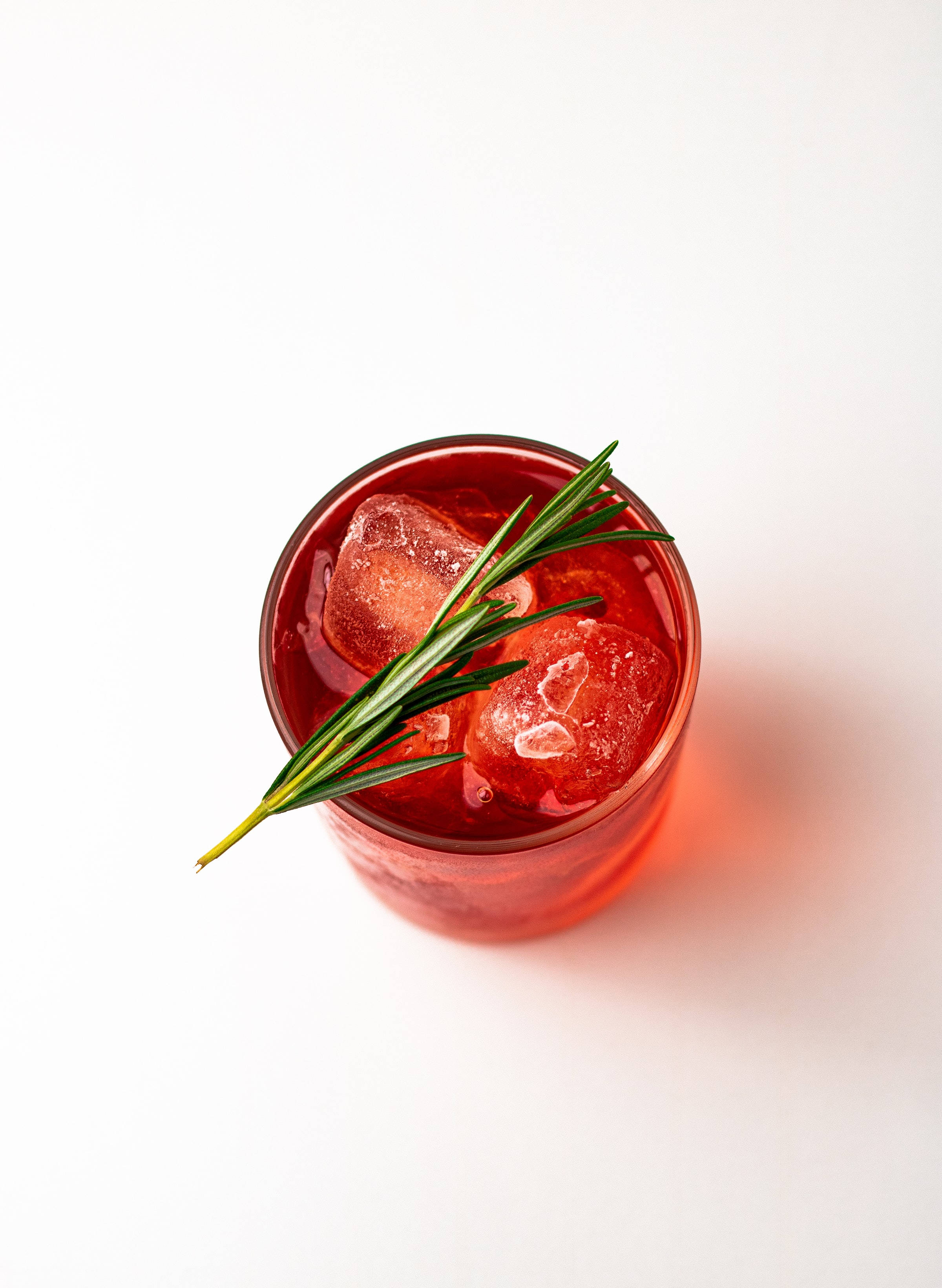 Red Gin, vibrant red cocktail, glass, 2K Phone Wallpaper