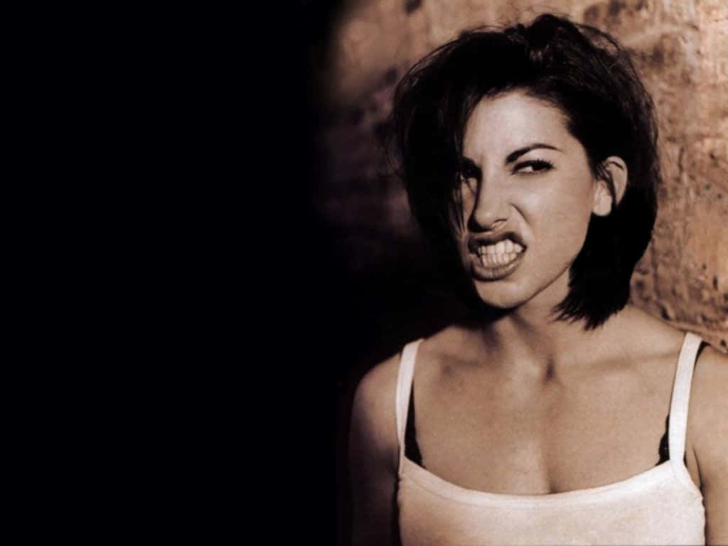 Gina Gershon, short dark hair, textured wall, SD Desktop Wallpaper