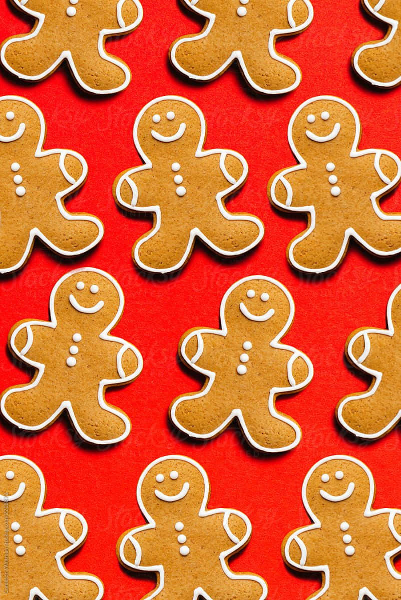gingerbread men, white icing smiles, buttons, SD Phone Wallpaper