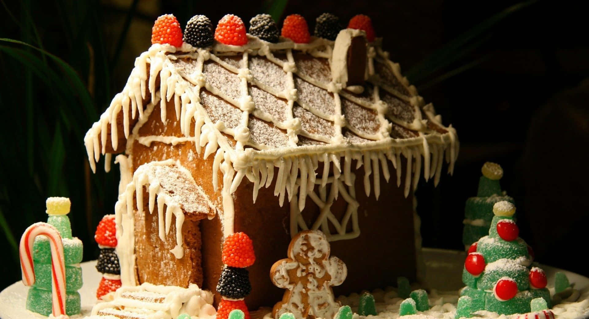 classic gingerbread house design, white icing icicles, red black and orange candied berries, Full HD Desktop Wallpaper