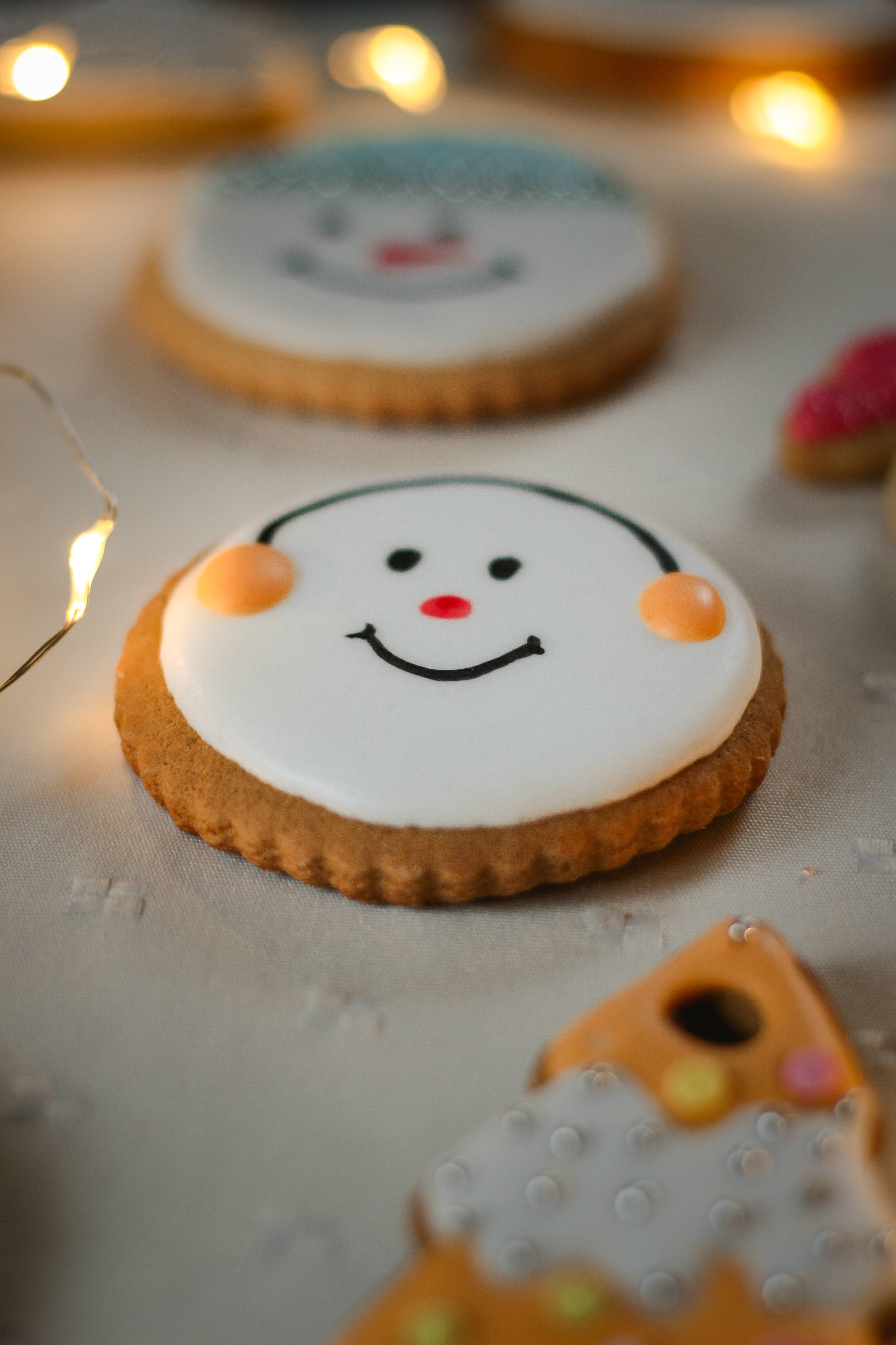 snowman cookies, white icing, orange cheeks, 4K Phone Wallpaper