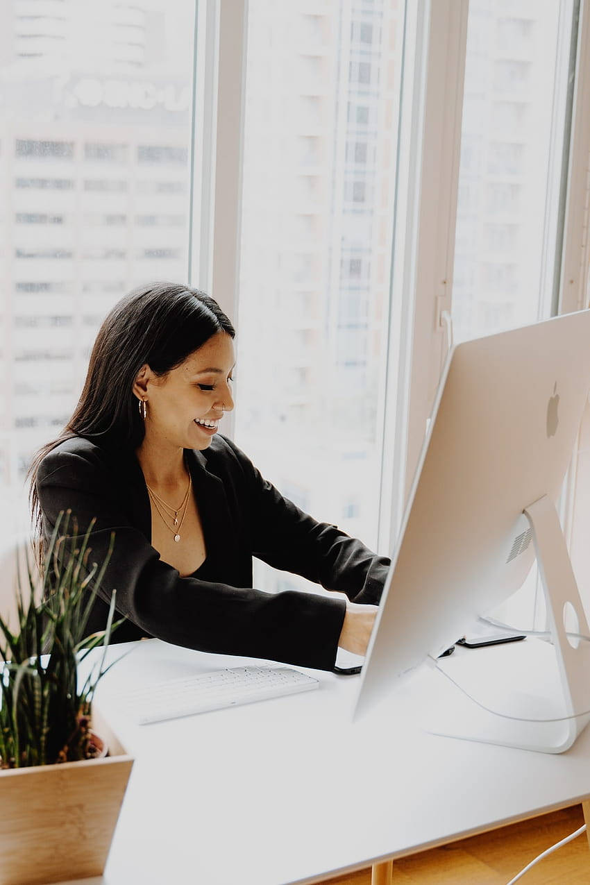 black blazer, white desk, sleek iMac, SD Phone Wallpaper