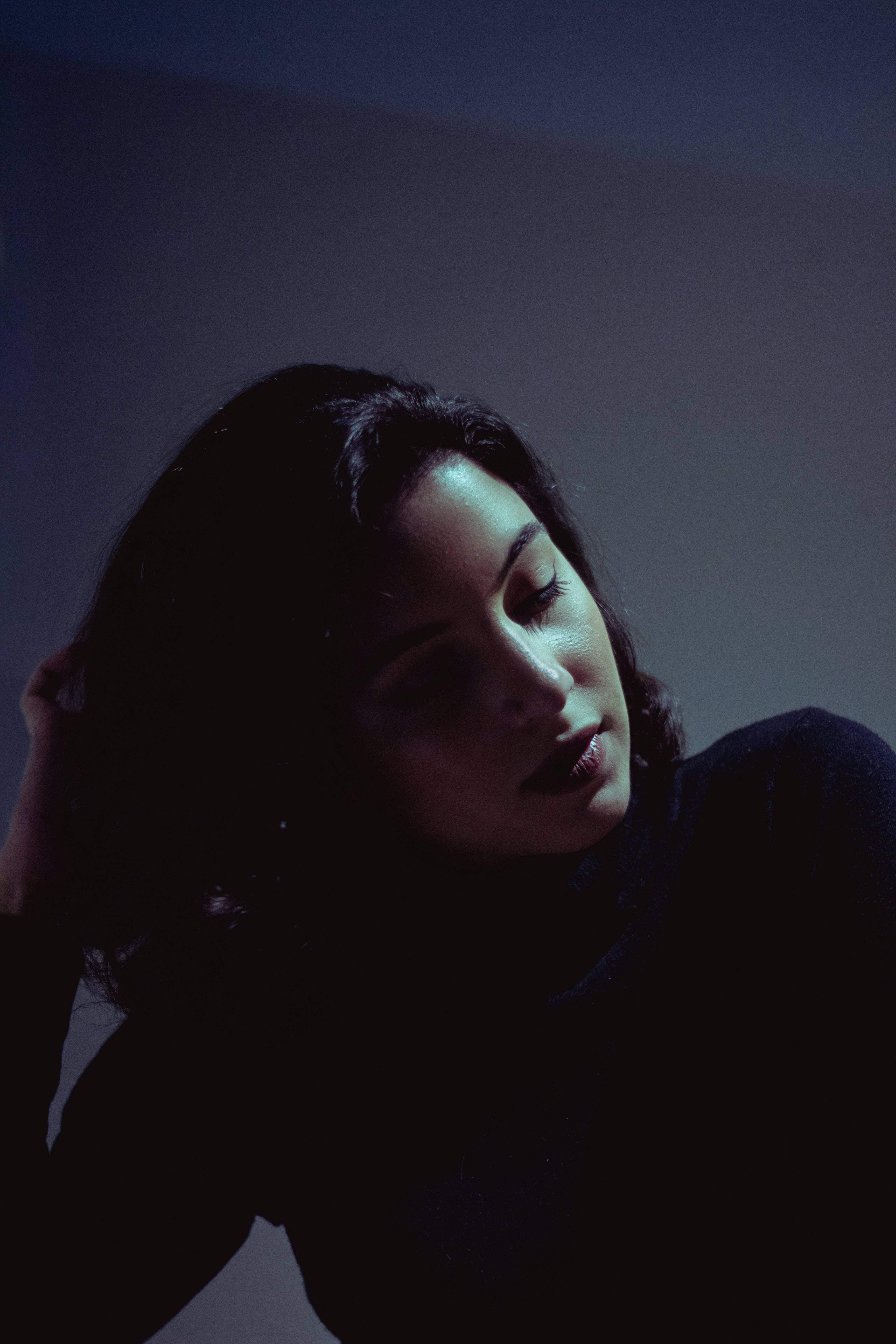 Latina girl, shadowed darkness, cool blue light, 5K Phone Wallpaper