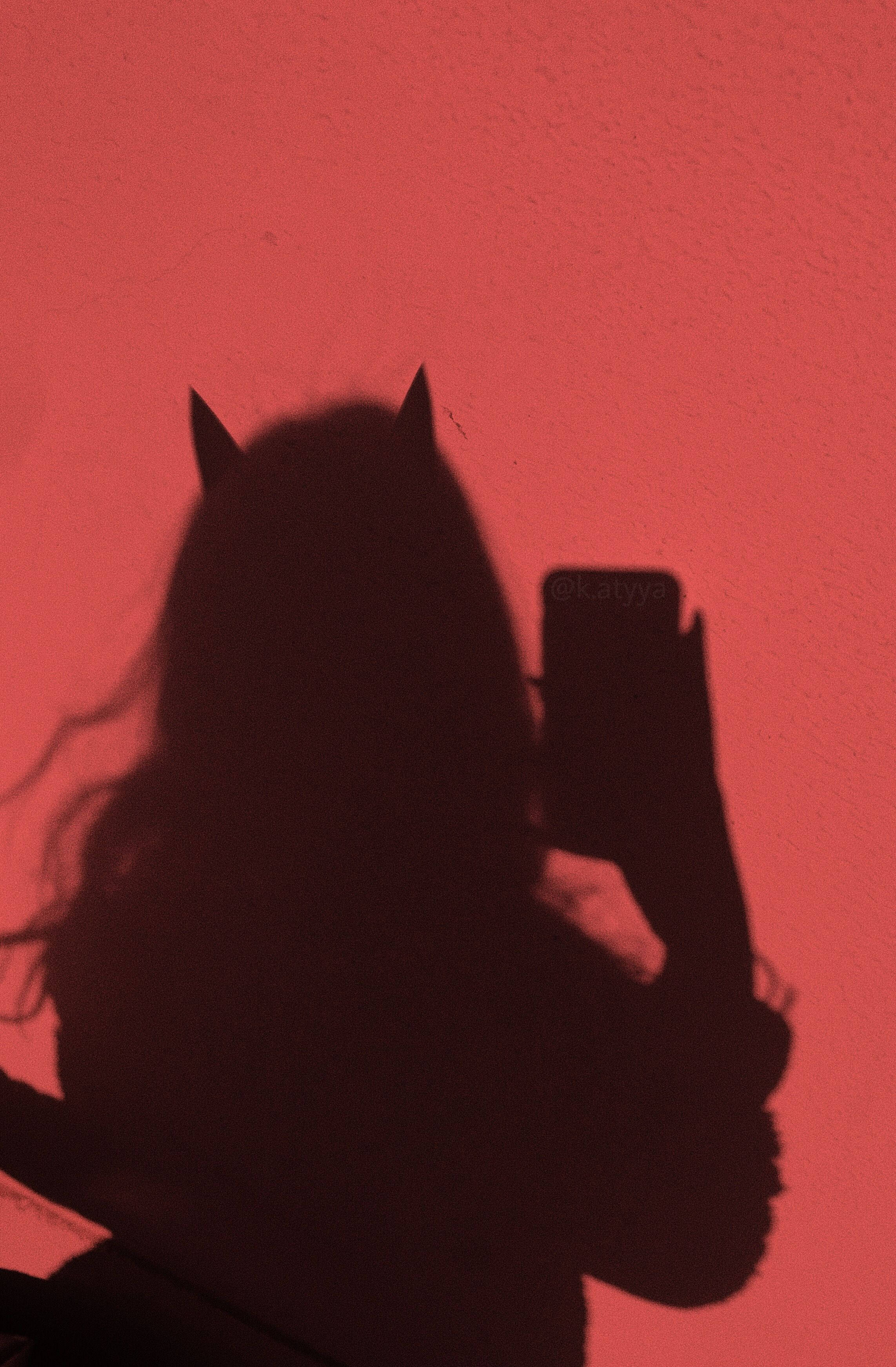 red silhouette, devil horns, textured wall, 2K Phone Wallpaper