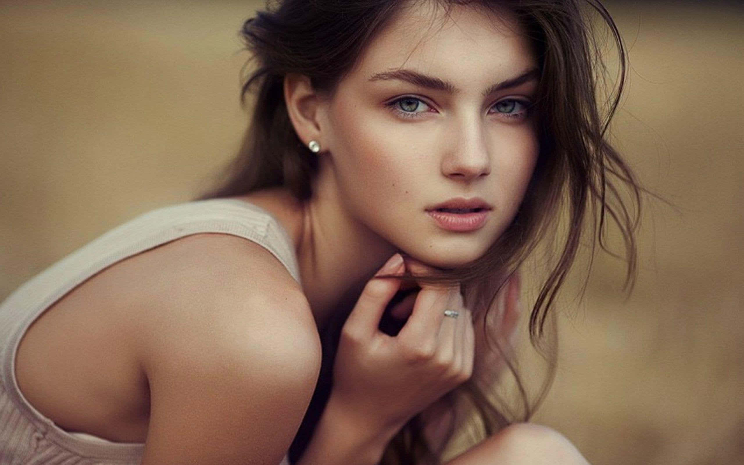 Ukrainian, blue eyes, tousled brown hair, 2K Desktop Wallpaper