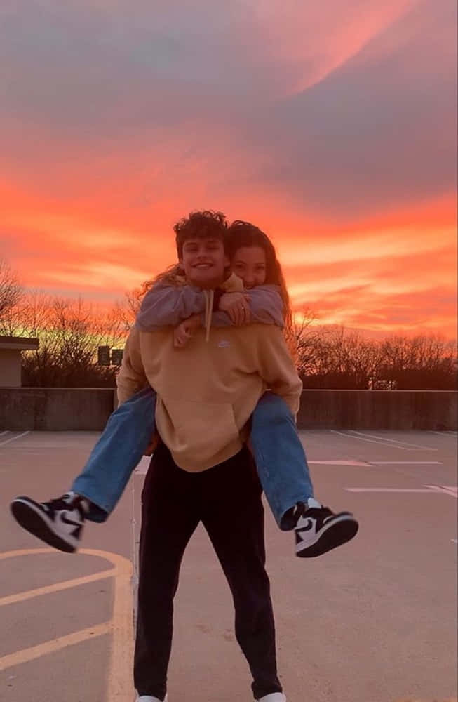 Girlfriend and Boyfriend, vibrant sunset sky, SD Phone Wallpaper