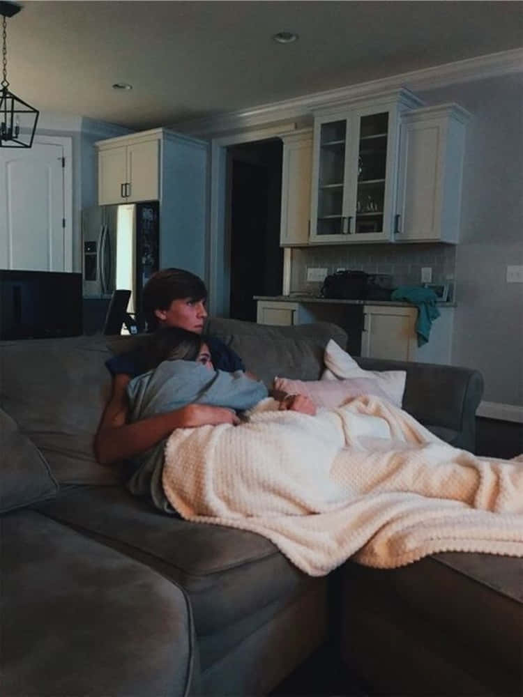 girlfriend and boyfriend, gray couch, cozy blanket, SD Phone Wallpaper