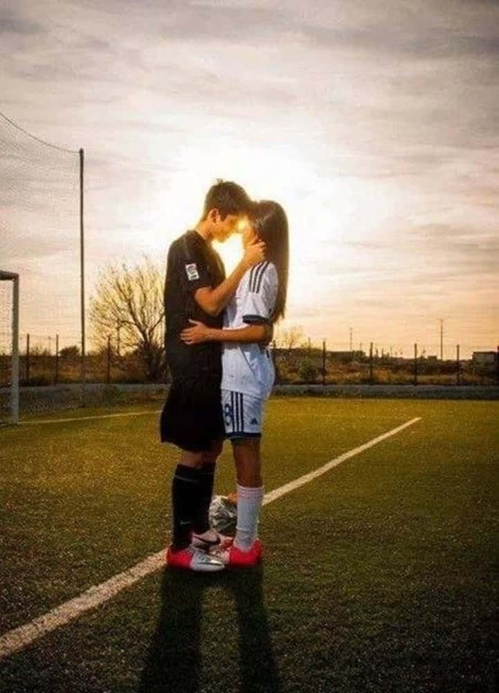 Girlfriend And Boyfriend, soccer uniforms, sunlit field, SD Phone Wallpaper
