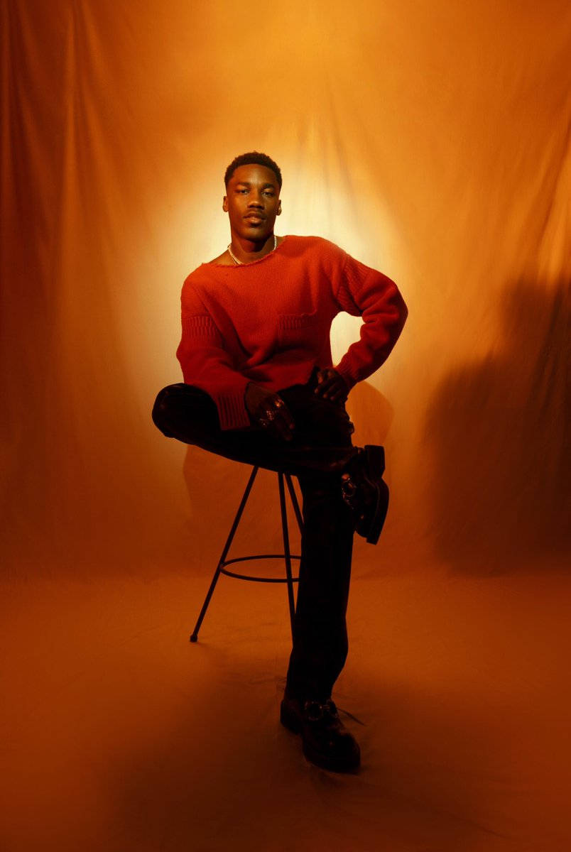Giveon, red sweater, stool, SD Phone Wallpaper