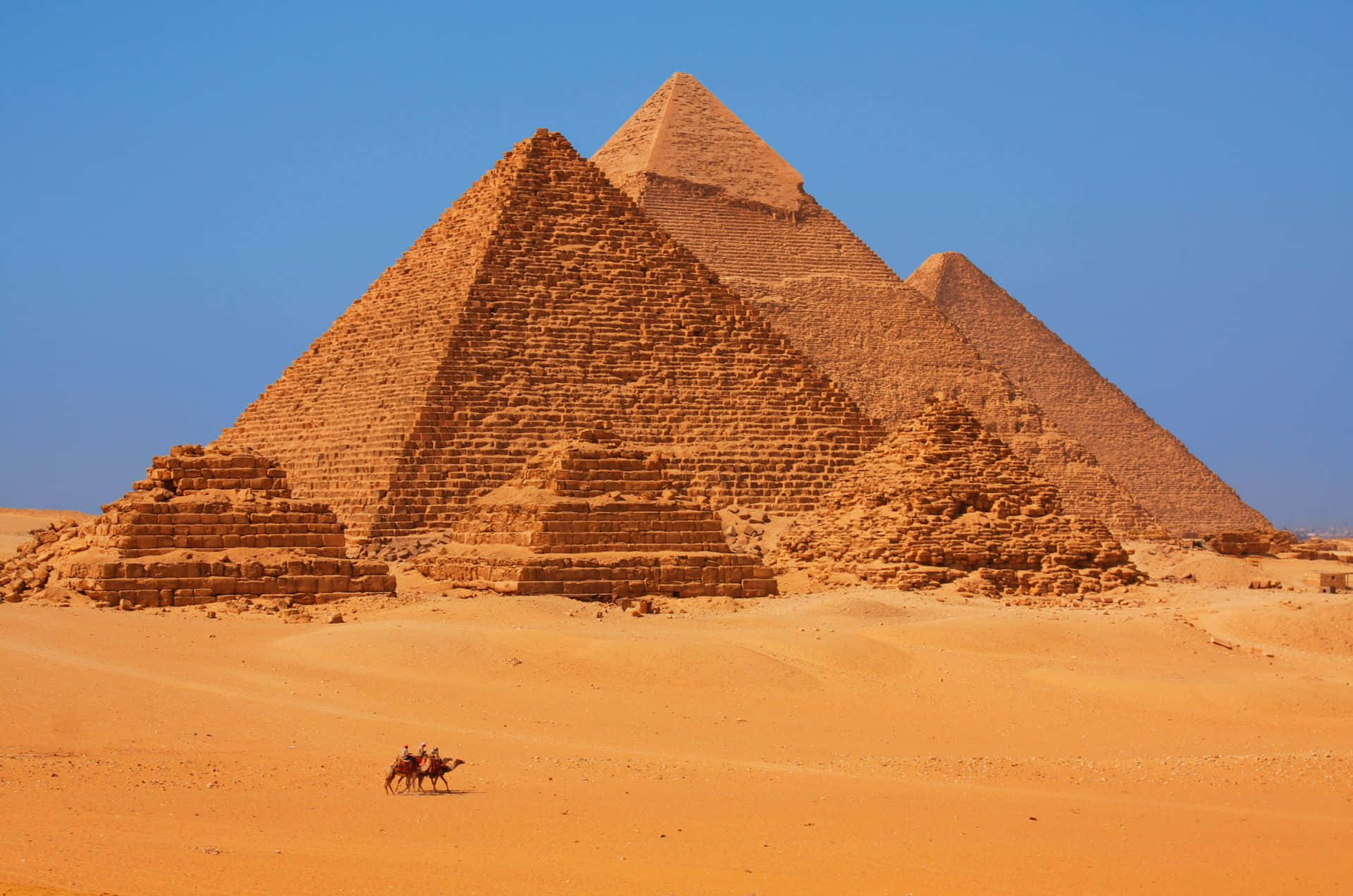Pyramids of Giza, rust-colored hue, golden desert sands, Full HD Desktop Wallpaper
