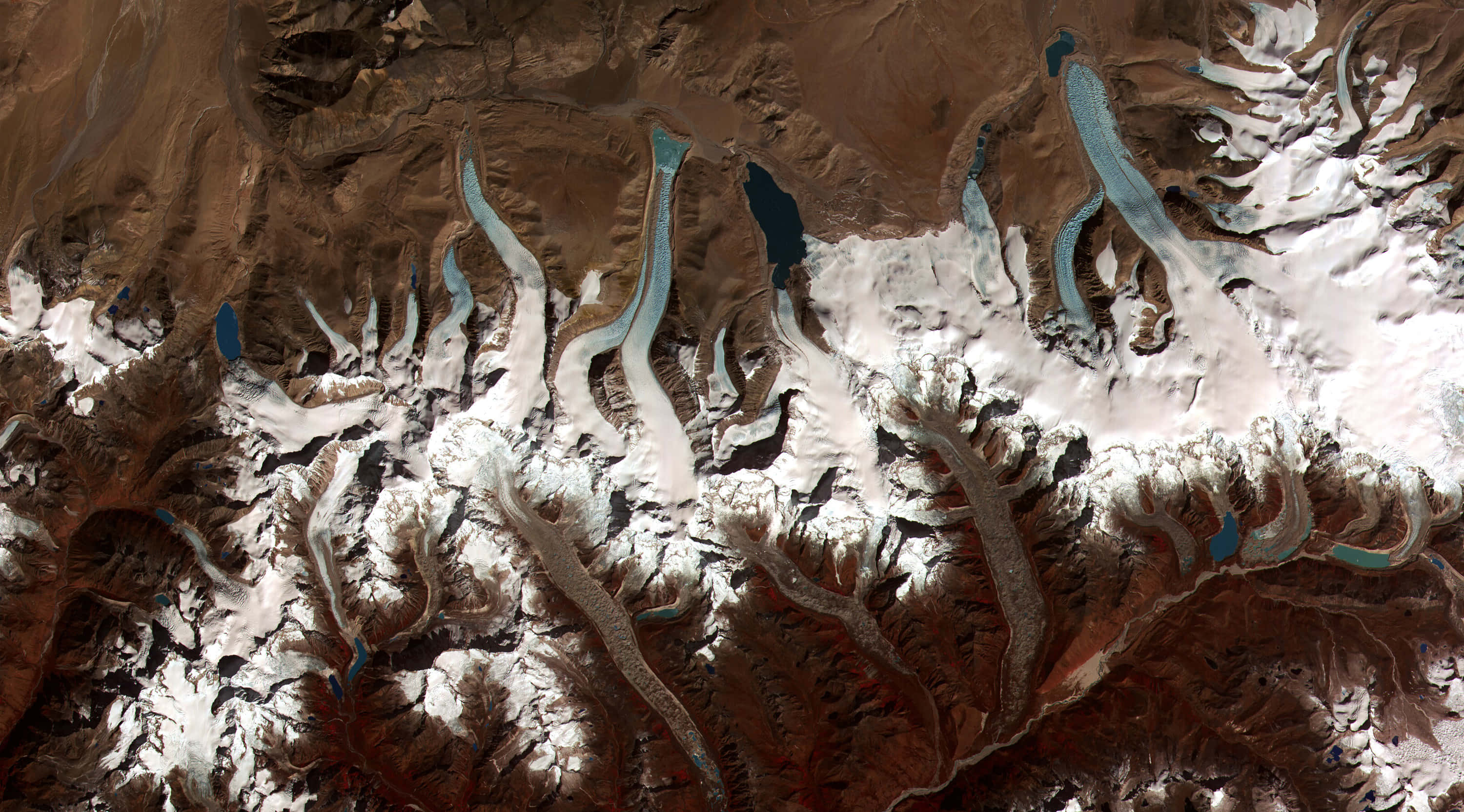 aerial glacial landscape, satellite view, rugged brown mountains, 2K Desktop Wallpaper
