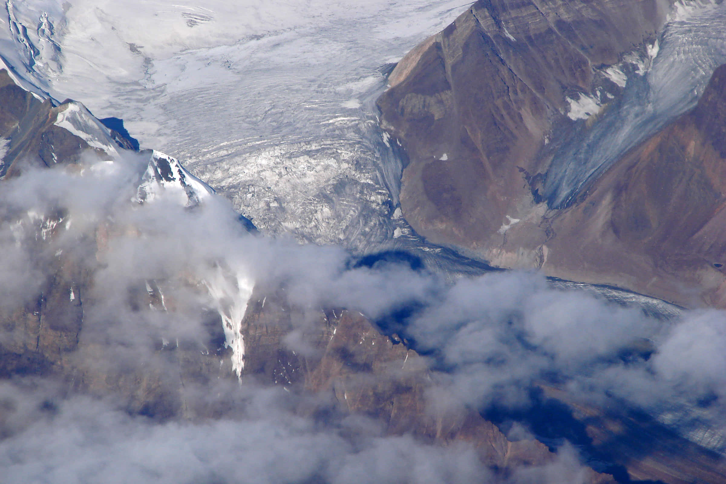 aerial glacial landscape view, massive glacier, rugged brown mountains, Full HD Desktop Wallpaper