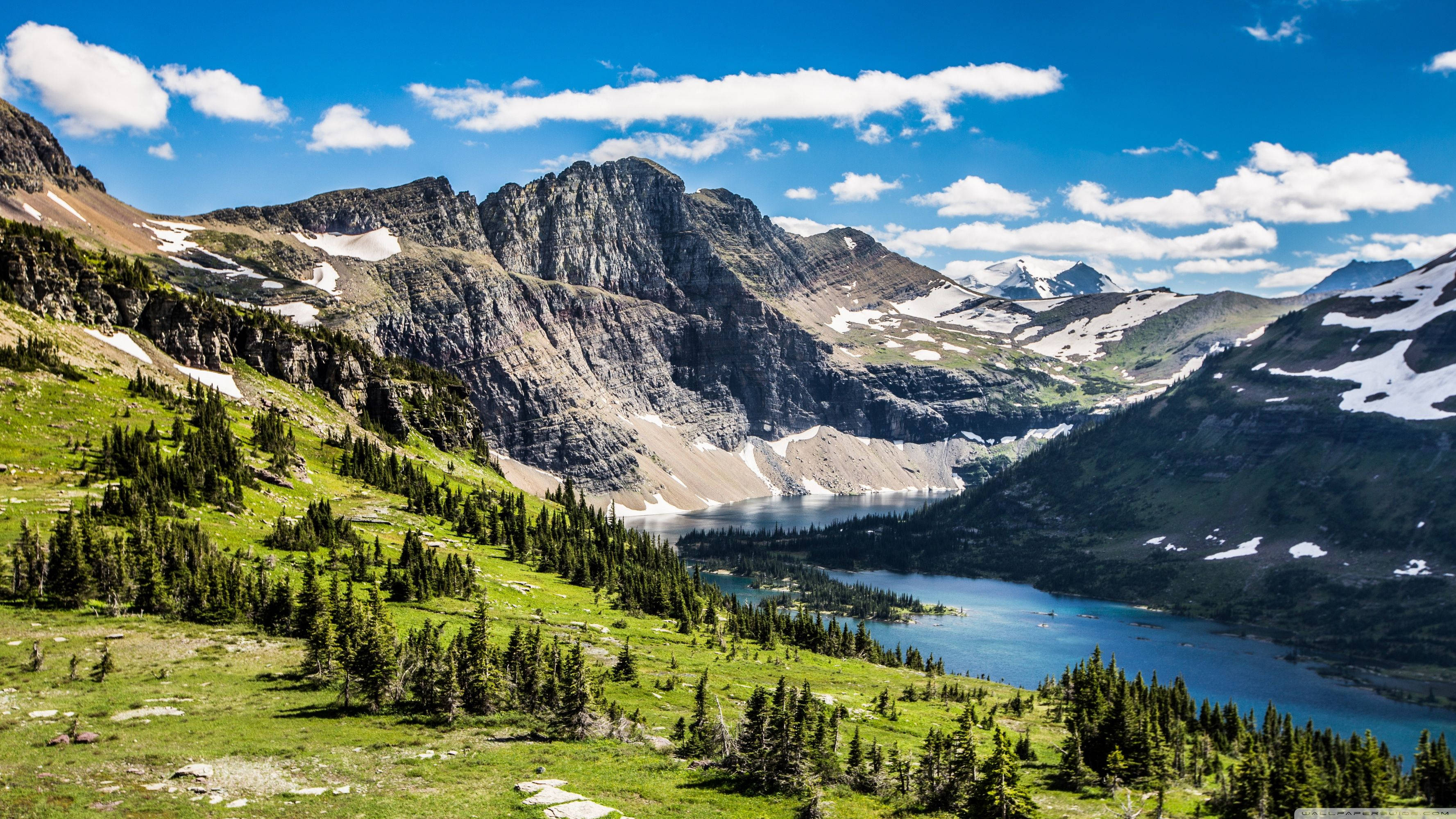 Glacier National Park, alpine lake, rugged snow-dusted mountains, 2K Desktop Wallpaper