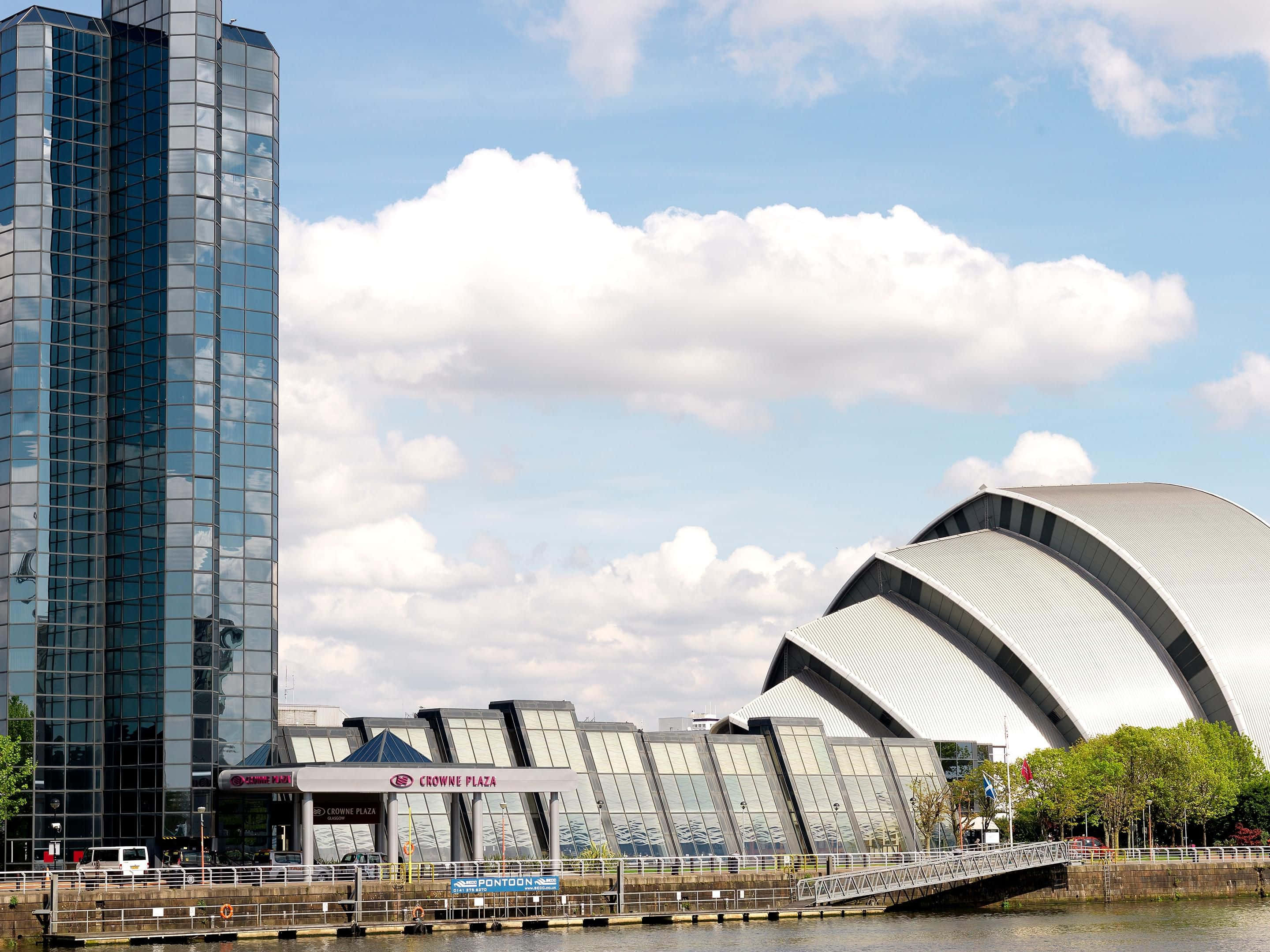 Glasgow cityscape, modern glass skyscraper, curved silver concert hall, 2K Desktop Wallpaper