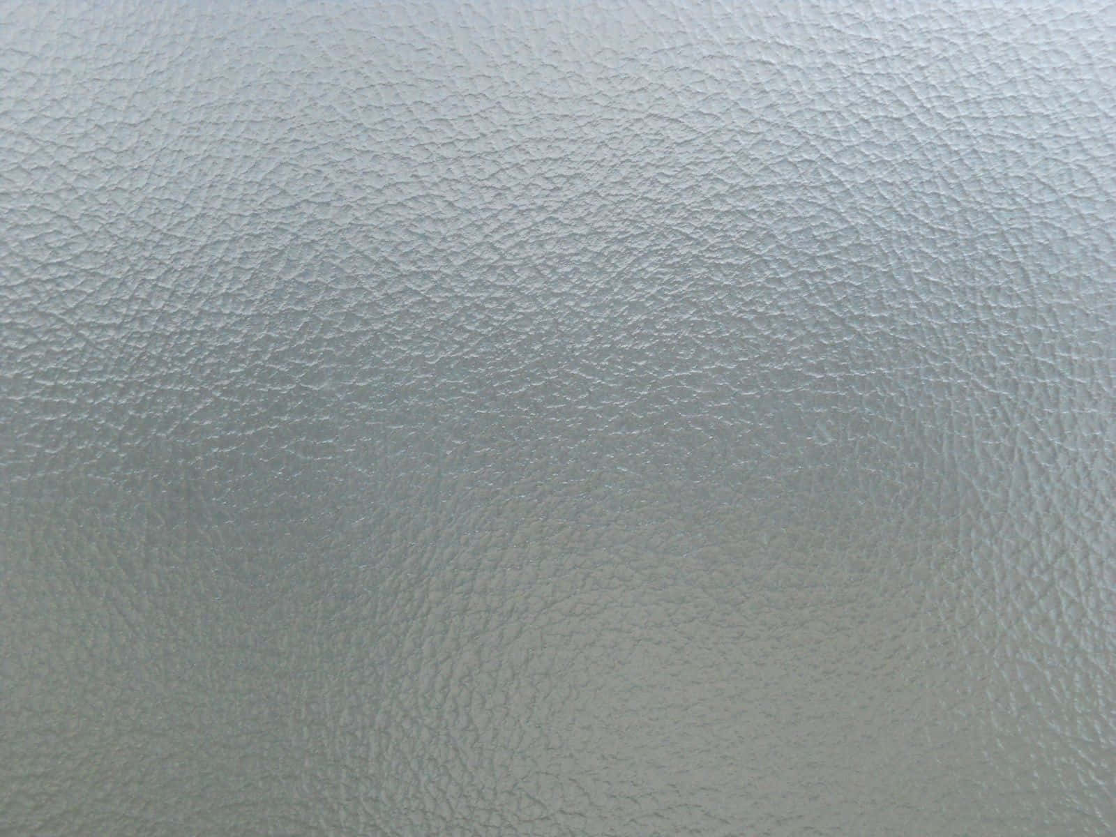 crystal clear glass, smooth gray textured surface, subtle grain patterns, HD Desktop Wallpaper