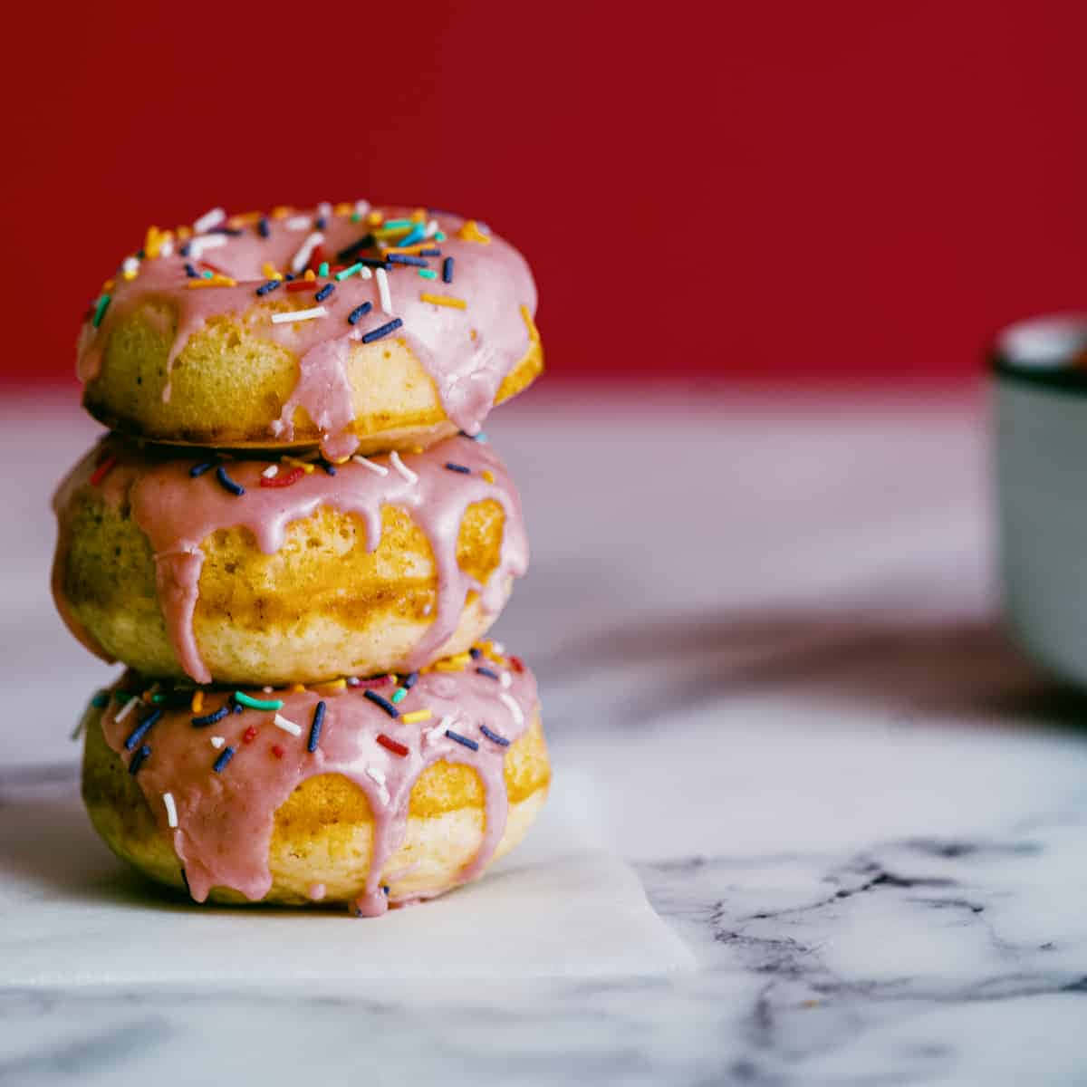 glazed donut, marble surface, bold red background, SD Desktop Wallpaper
