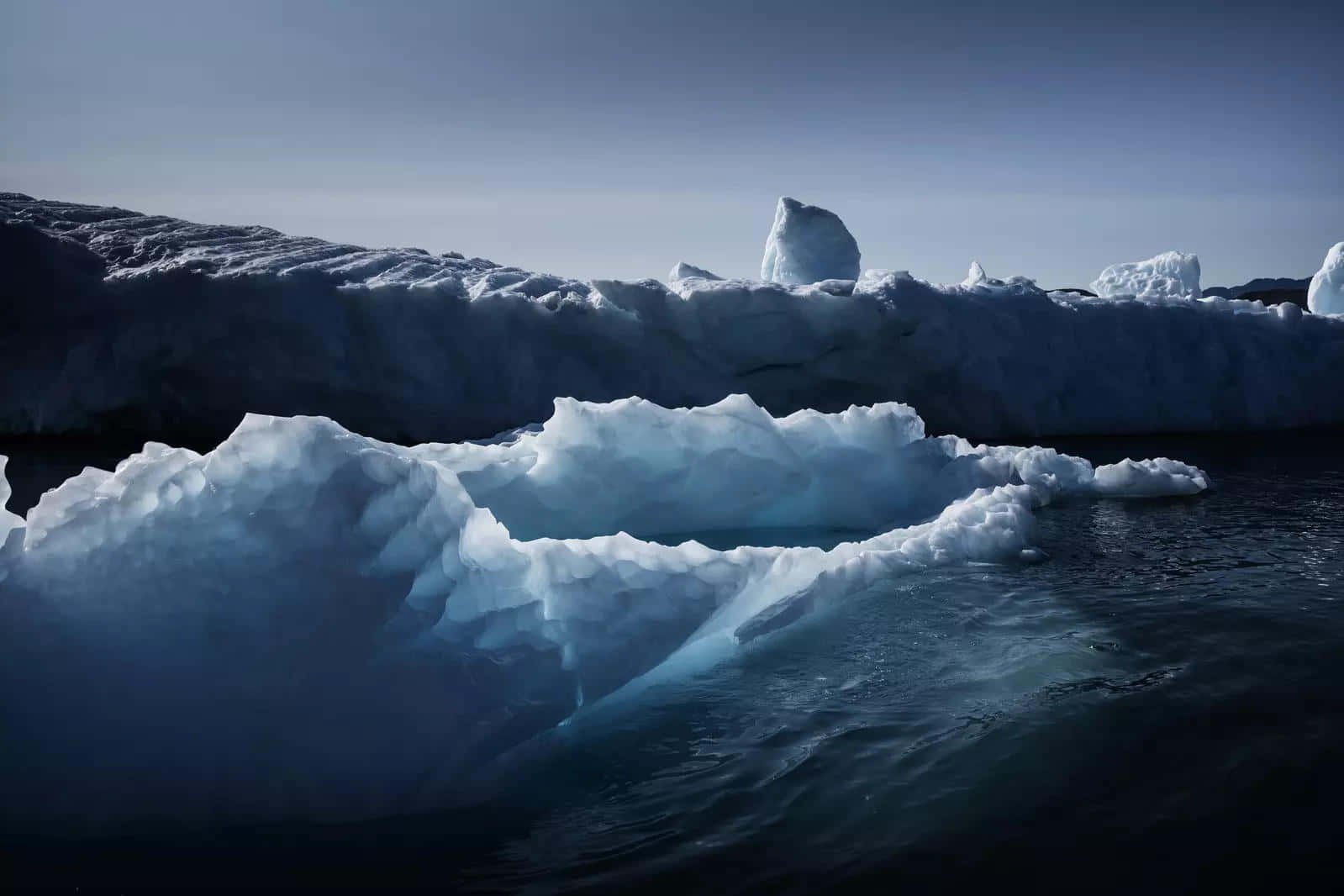 massive iceberg, jagged blue-white peaks, dark ocean waters, HD Desktop Wallpaper