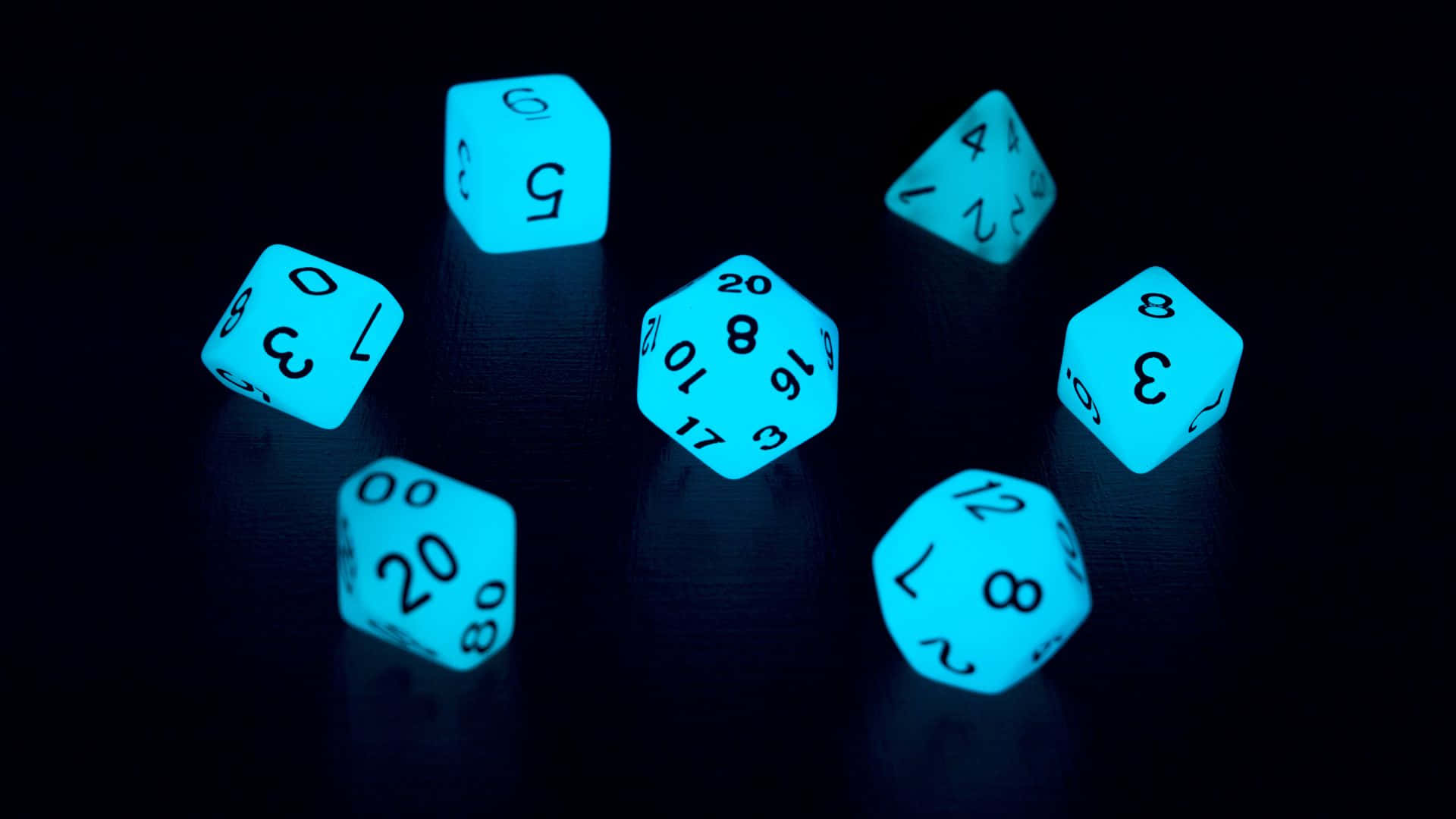 glowing cyan polyhedral dice, dark surface, soft reflections, Full HD Desktop Wallpaper