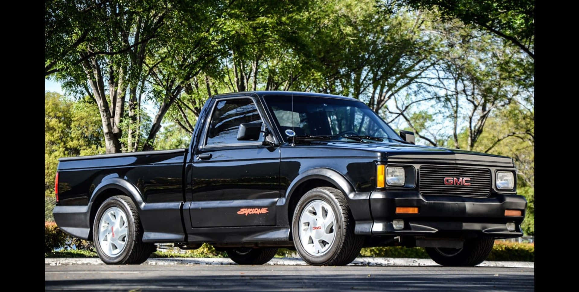 GMC Syclone, sleek black, bright sunlight, HD Desktop Wallpaper