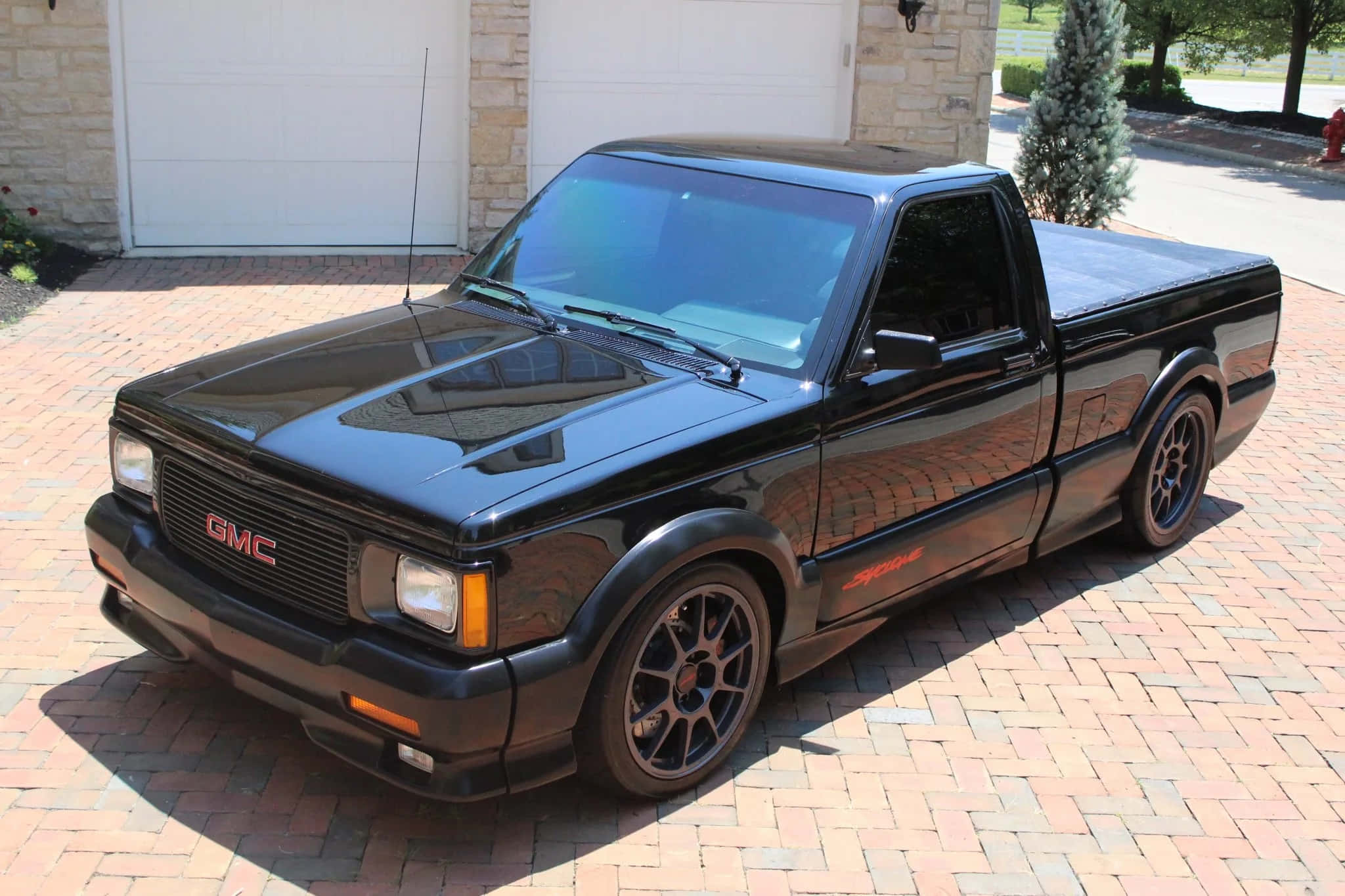 GMC Syclone, glossy black, red brick driveway, Full HD Desktop Wallpaper