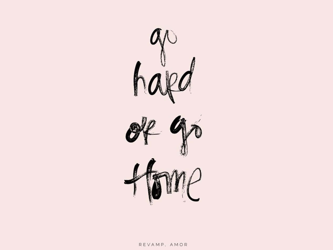 Go Hard Or Go Home, black brushstroke typography, soft pink background, SD Desktop Wallpaper