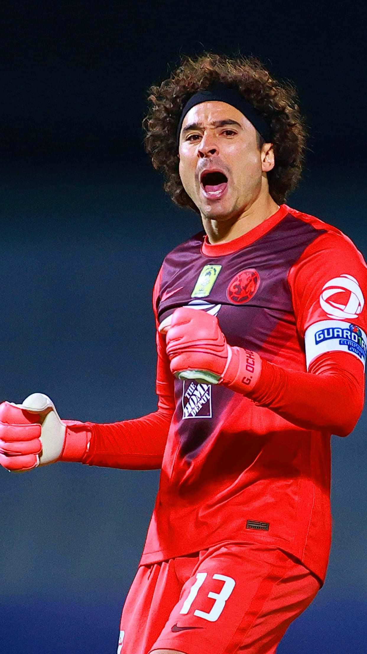 Goalkeeper, red uniform, stadium lights, Full HD Phone Wallpaper