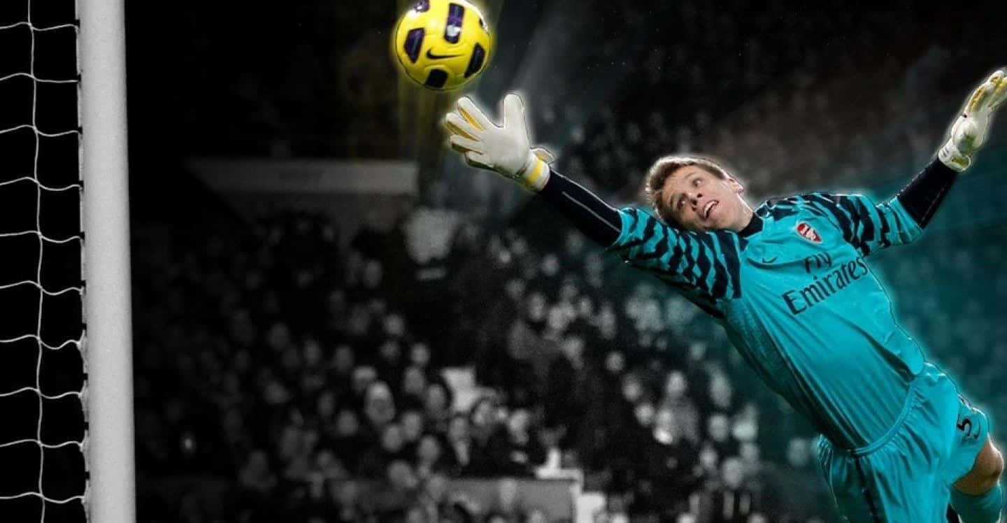 Agile Goalkeeper, teal jersey, yellow ball, HD Desktop Wallpaper