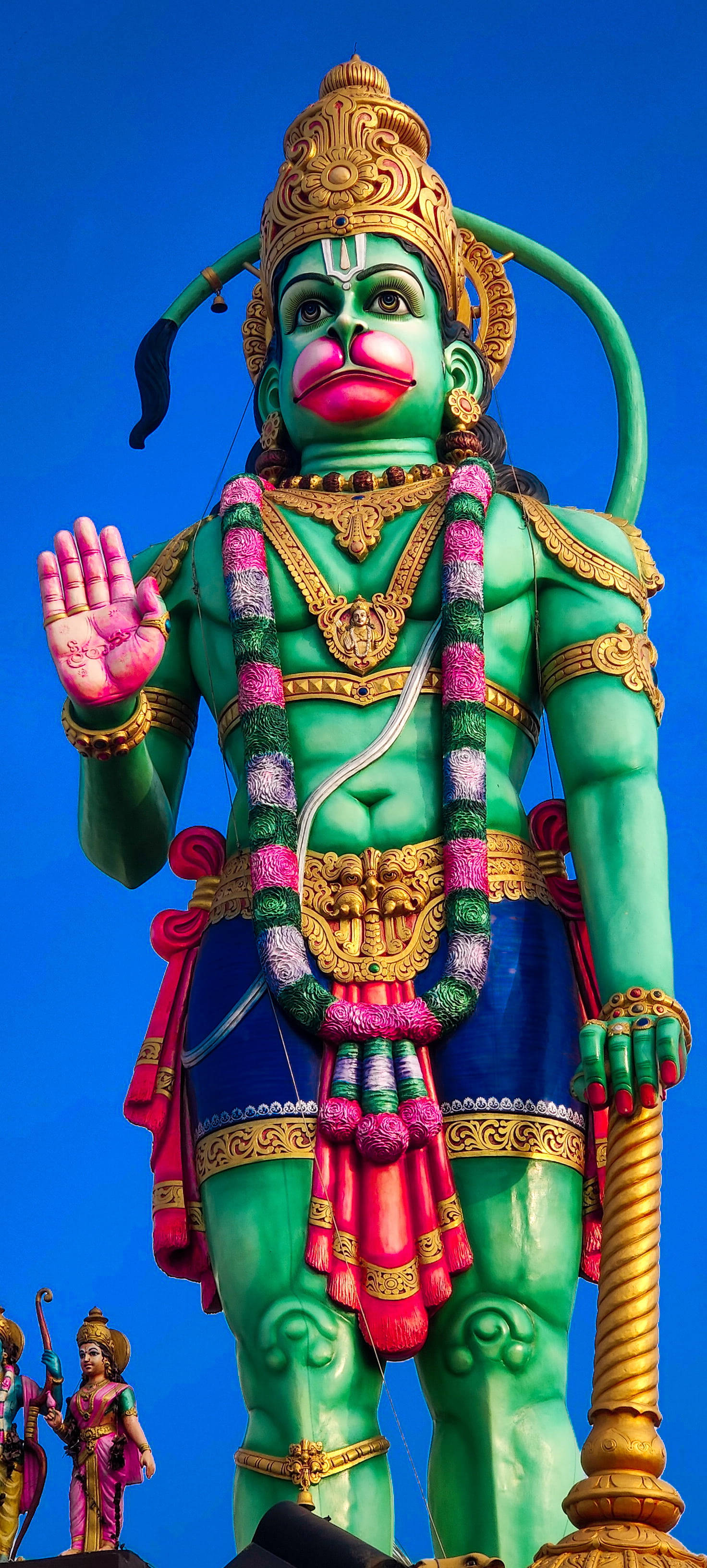 God Hanuman, gigantic green statue, gold ornaments, 2K Phone Wallpaper