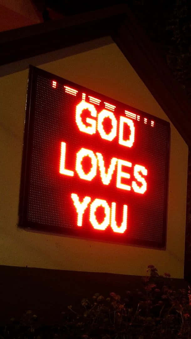God Loves You, glowing red LED sign, building, SD Phone Wallpaper