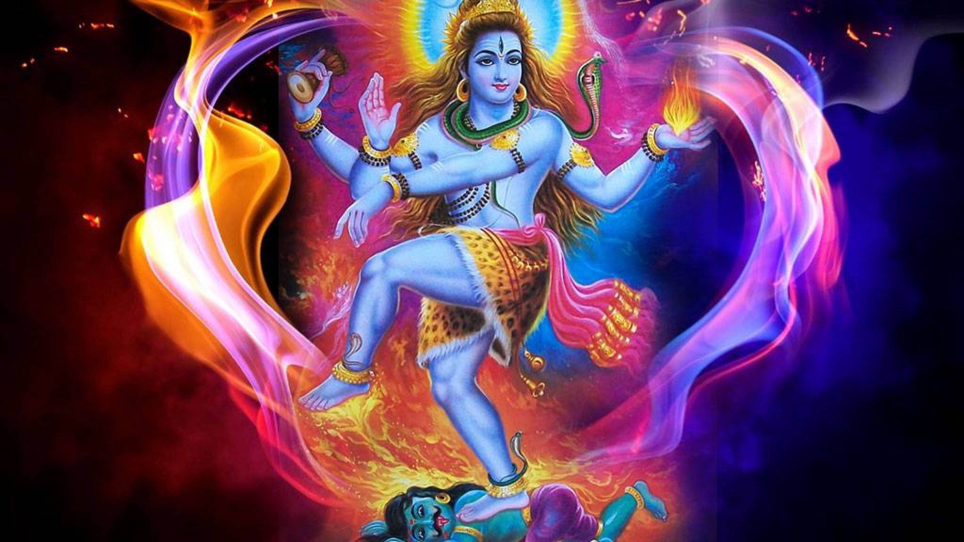 God Shiva, radiant blue-skinned, dances dynamically, 4K Desktop Wallpaper