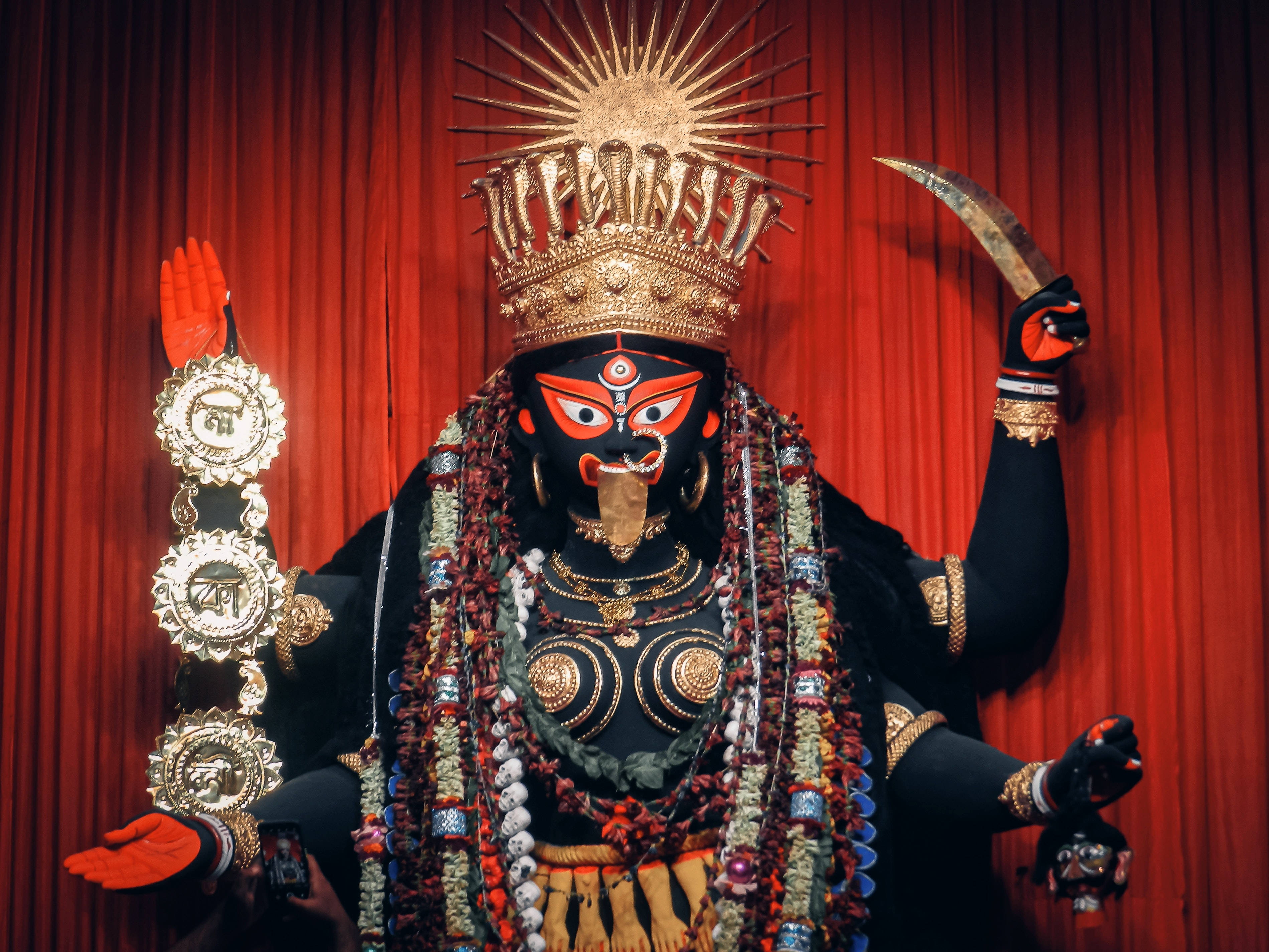 Goddess Kali, black-faced, gold crown jewels, 2K Desktop Wallpaper
