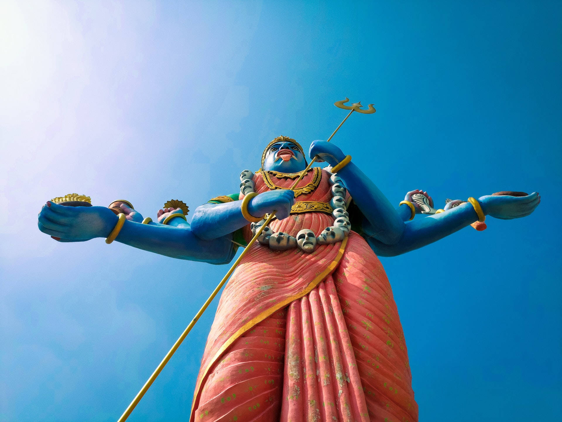Goddess Kali, blue-skinned, multiple arms, Full HD Desktop Wallpaper