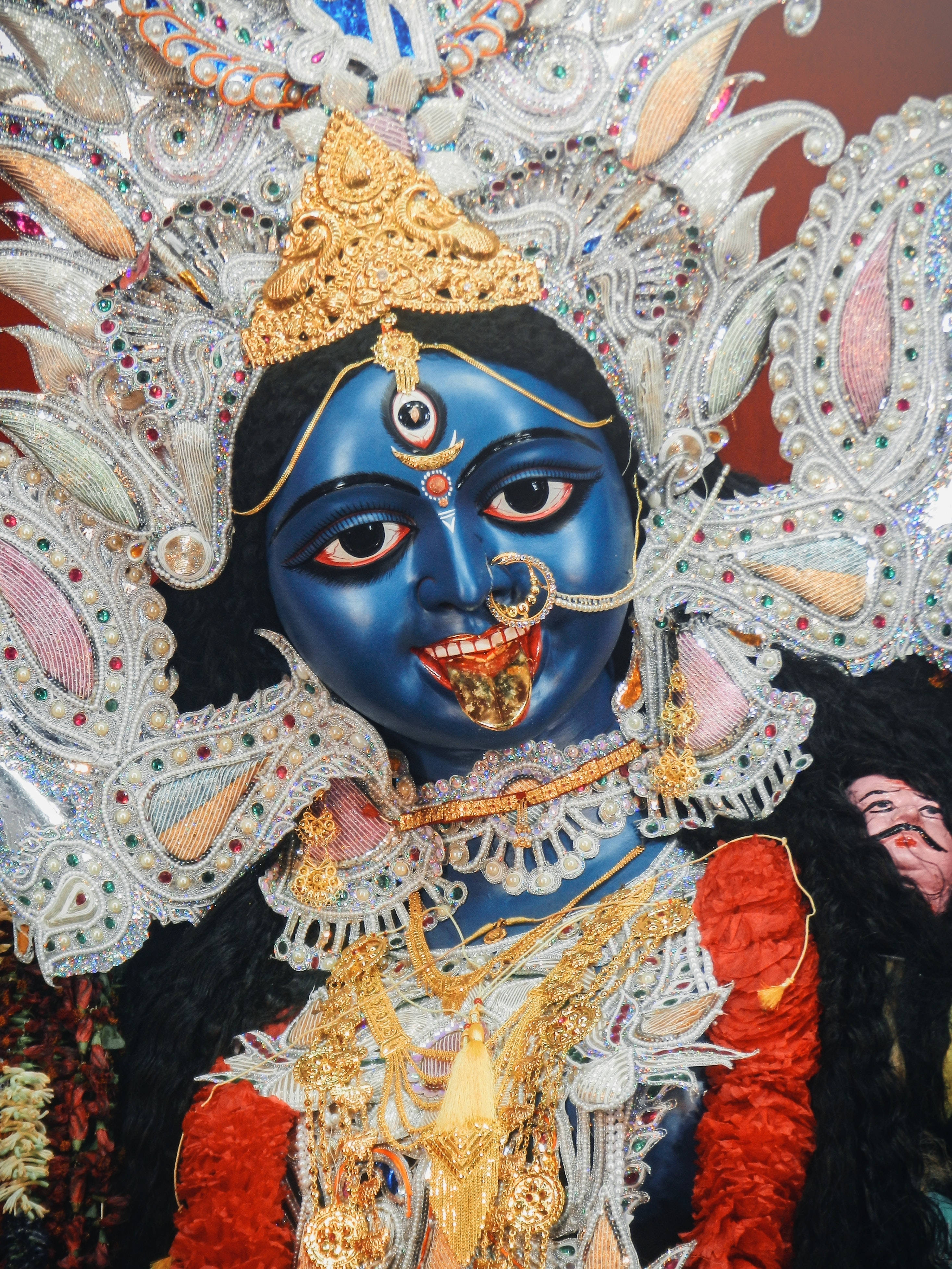 Goddess Kali, blue-skinned, golden jewelry, 4K Phone Wallpaper